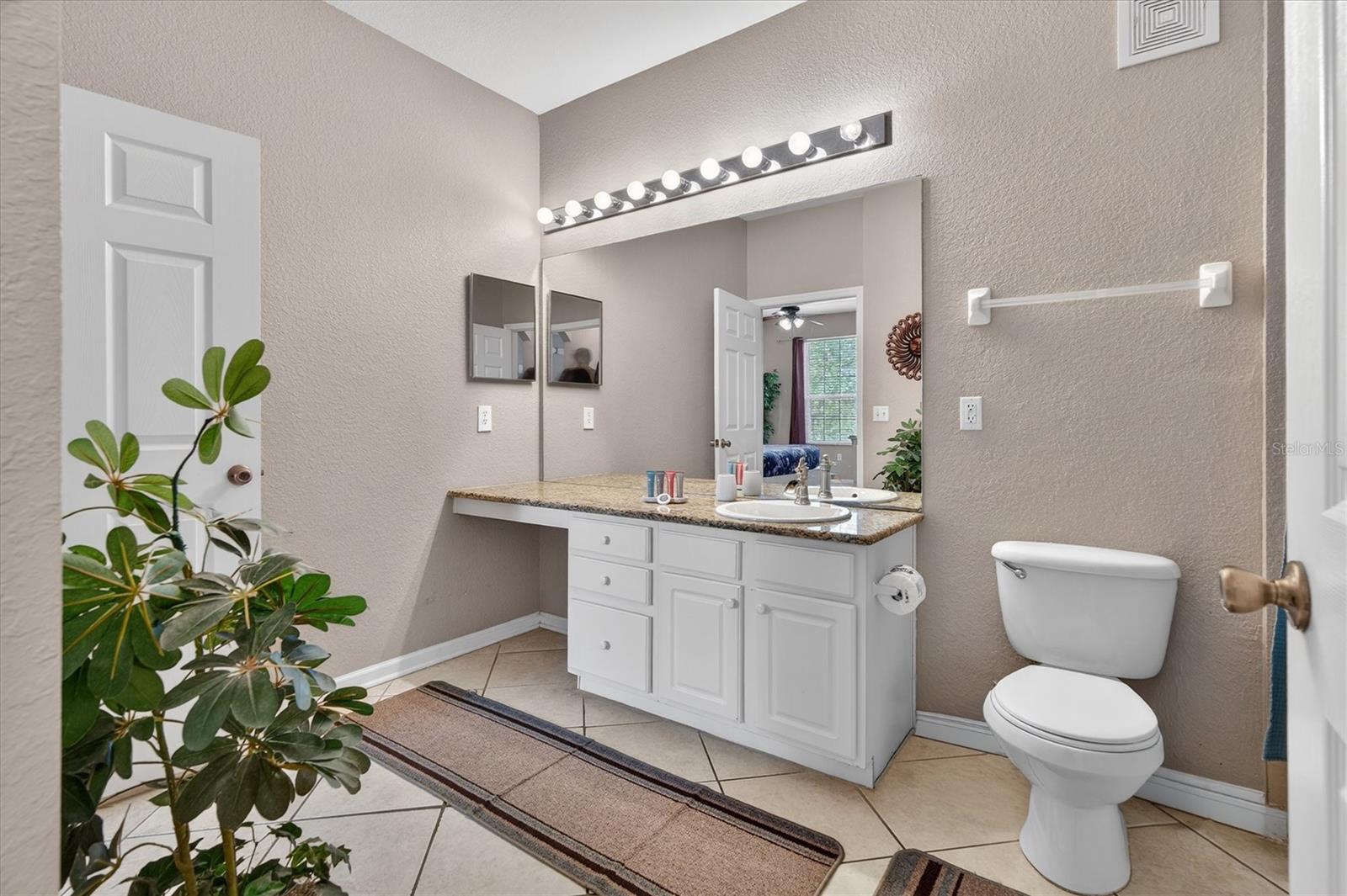 Living Room & Balcony View - 7664 COMROW ST #304, KISSIMMEE