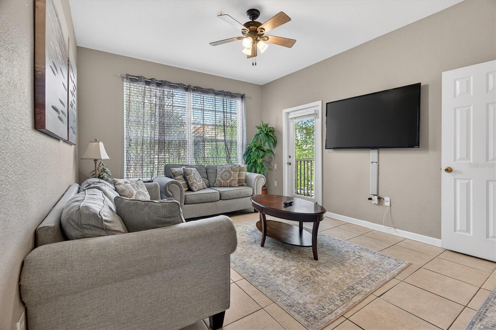 Living Room - 7664 COMROW ST #304, KISSIMMEE