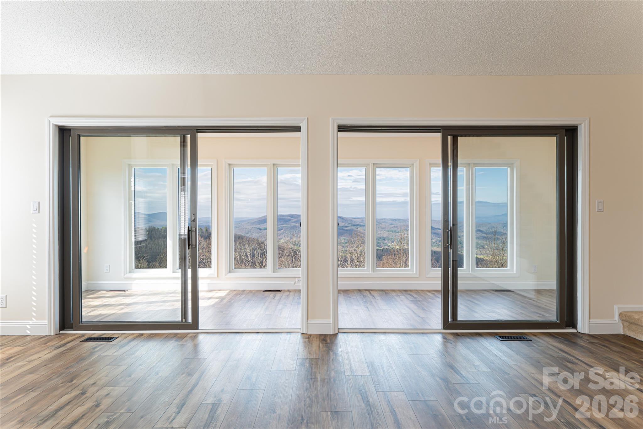 Living room to sunroom - 1203 Fleetwood Plaza, Hendersonville