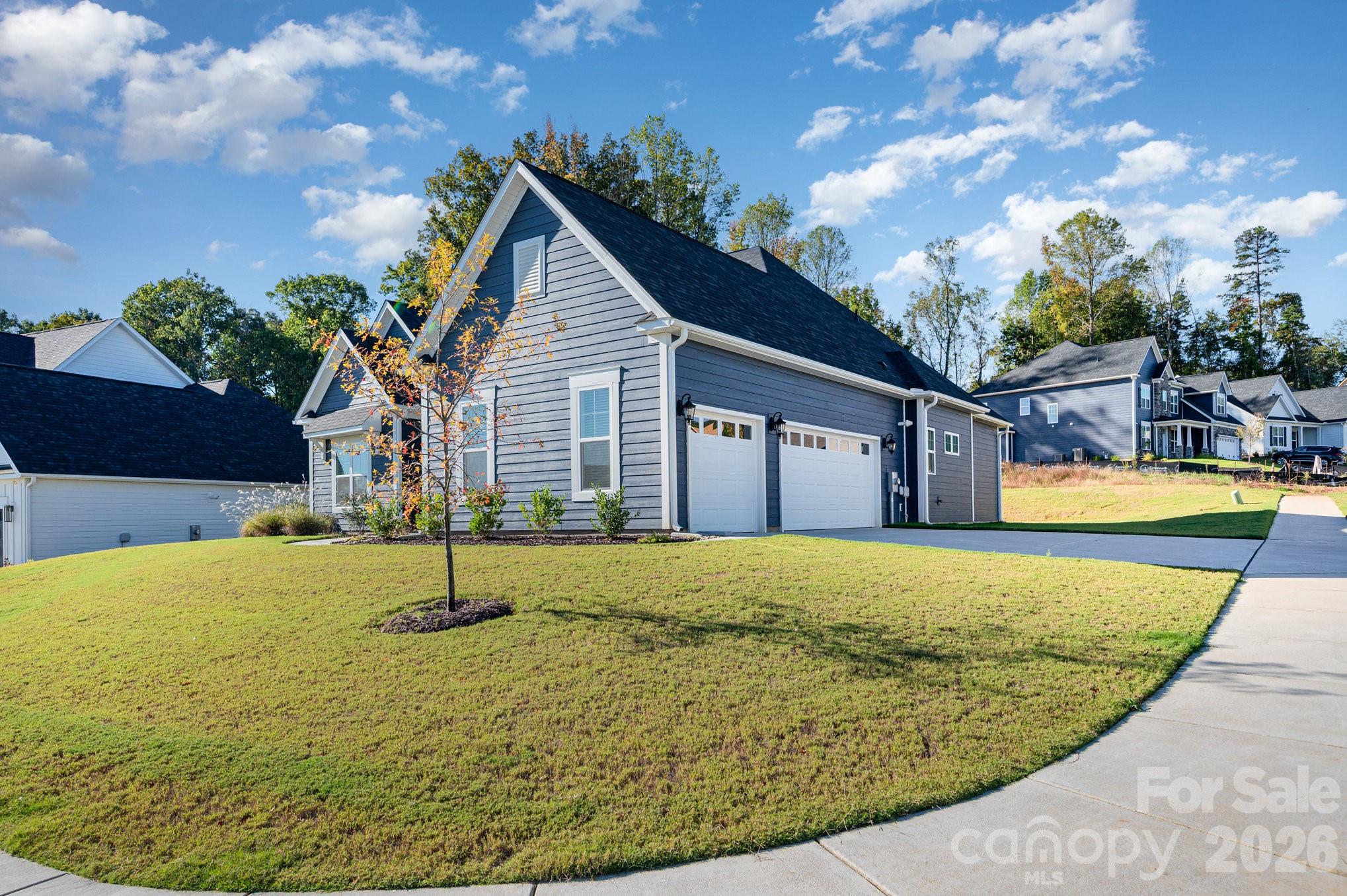 Spacious 3-car garage with plenty of driveway parking. - 456 Lucky Drive NW, Concord