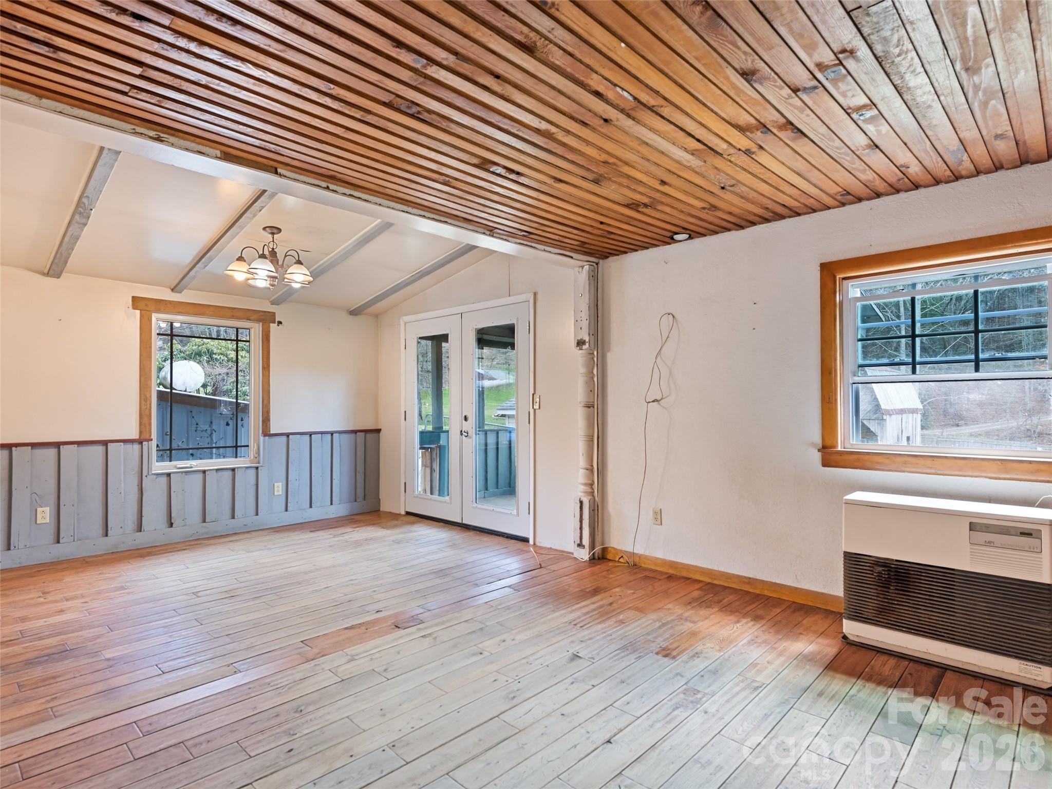 Open living area with access to screened in porch - 838 Hidden Valley Road, Clyde