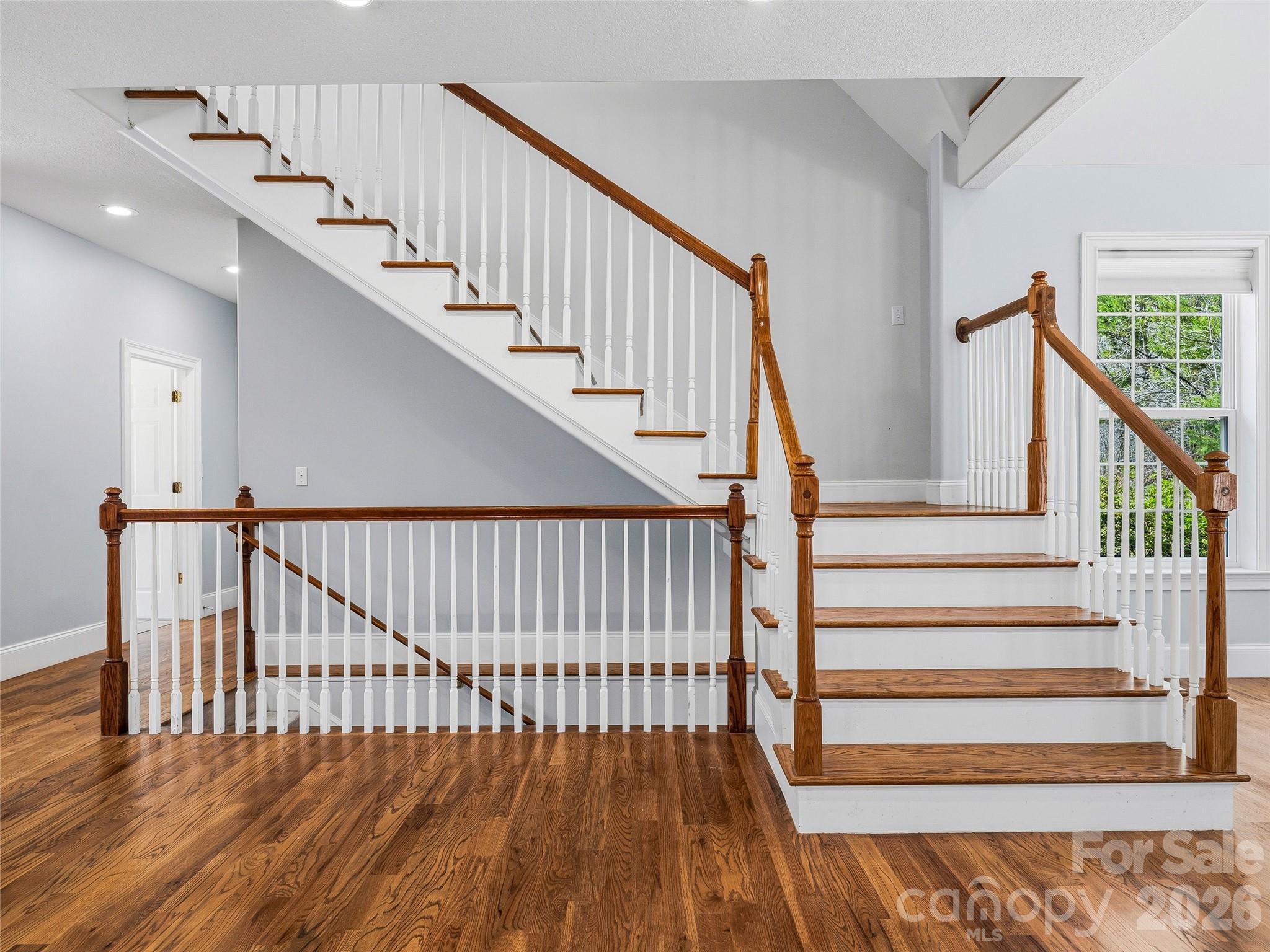 Stairs Leading Upstairs and to Walkout Basement - 196 Blackbird Lane, Tryon
