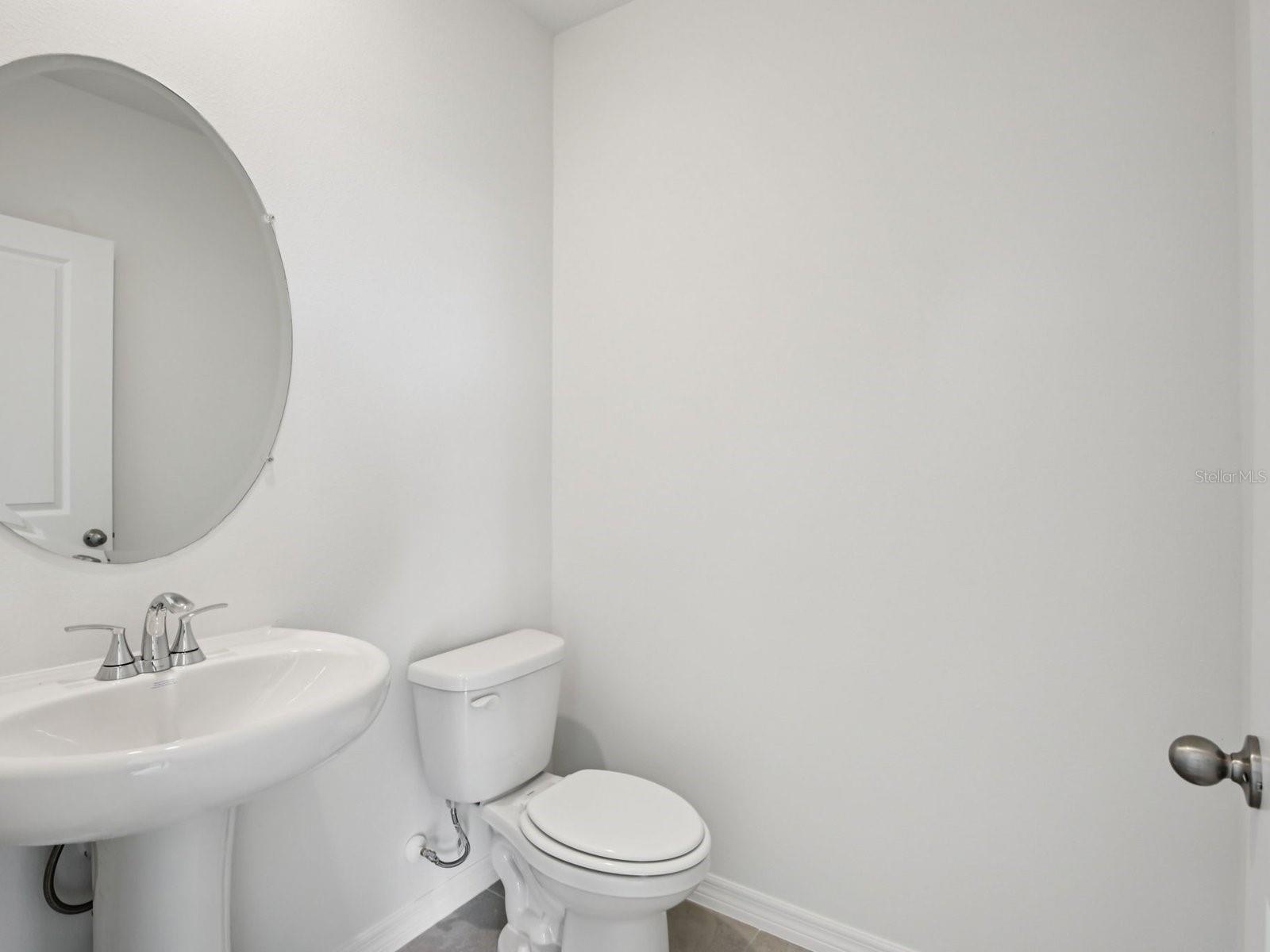Interior photos are not of the actual home but are photos of the builder home with the same floorplan with similar interior finishes and features. - 11329 BELLEWOOD TER, PARRISH