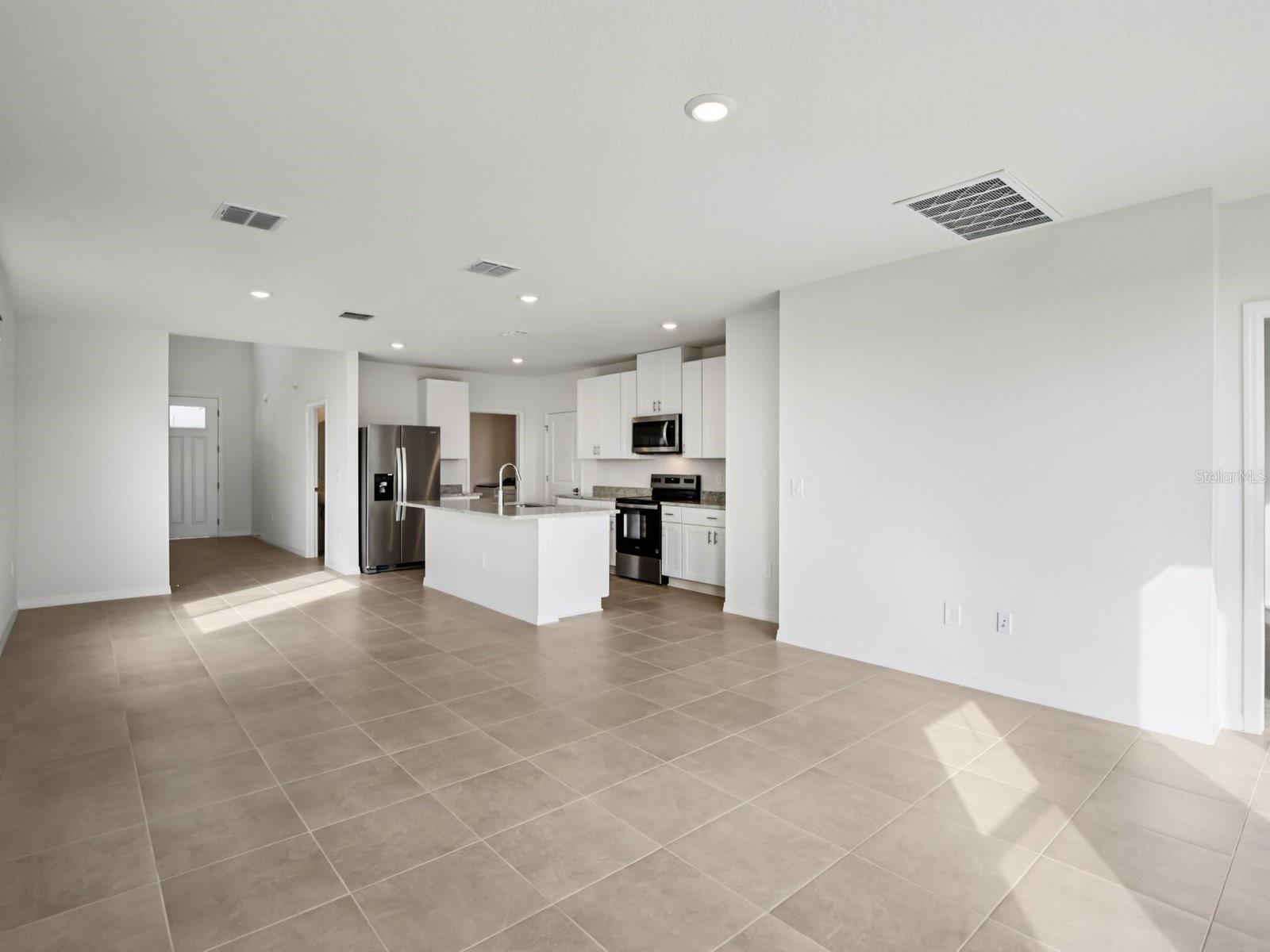 Interior photos are not of the actual home but are photos of the builder home with the same floorplan with similar interior finishes and features. - 11329 BELLEWOOD TER, PARRISH