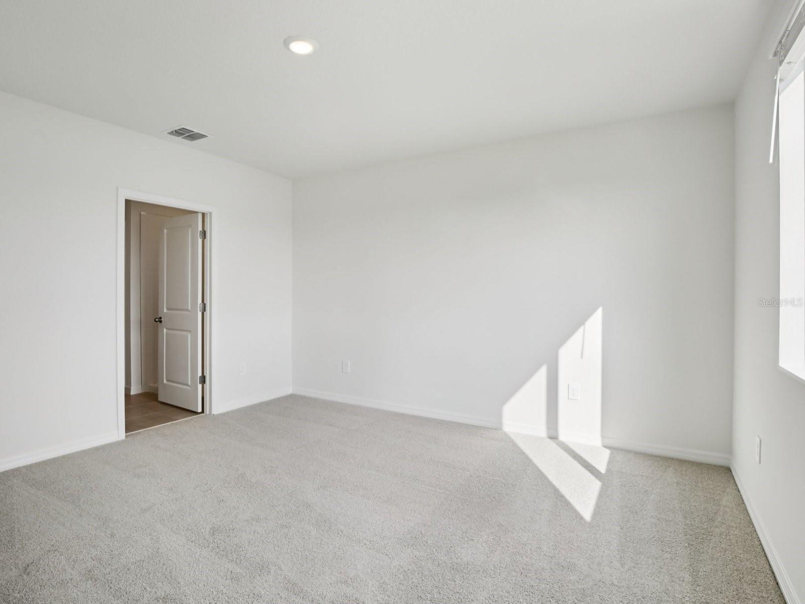 Interior photos are not of the actual home but are photos of the builder home with the same floorplan with similar interior finishes and features. - 11329 BELLEWOOD TER, PARRISH