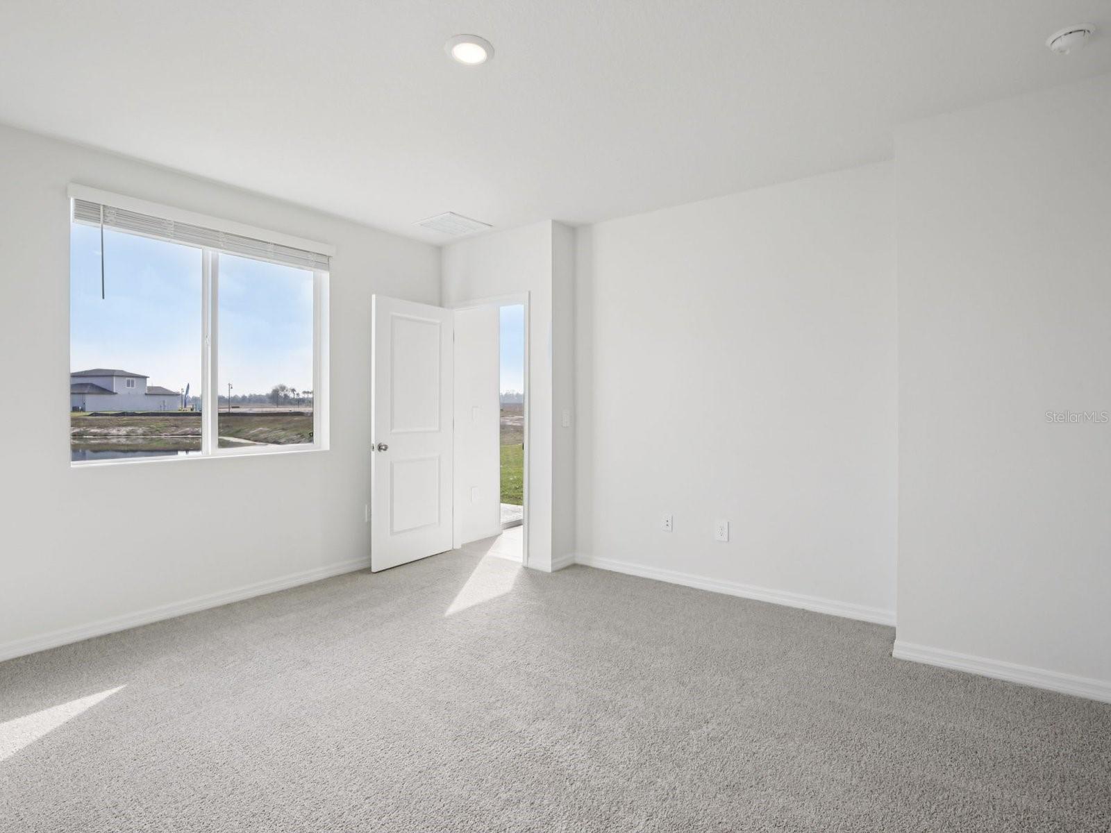 Interior photos are not of the actual home but are photos of the builder home with the same floorplan with similar interior finishes and features. - 11329 BELLEWOOD TER, PARRISH