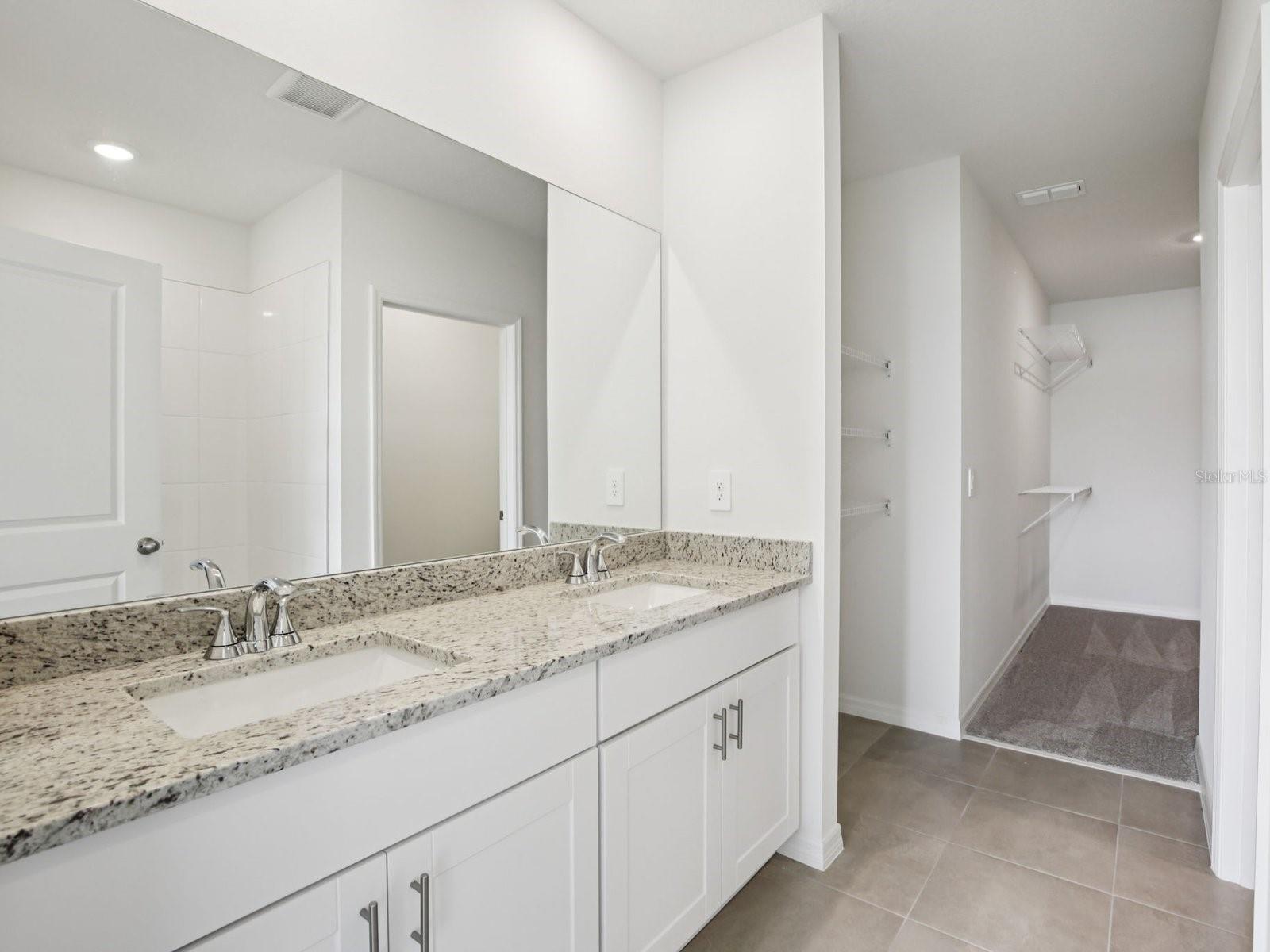 Interior photos are not of the actual home but are photos of the builder home with the same floorplan with similar interior finishes and features. - 11329 BELLEWOOD TER, PARRISH