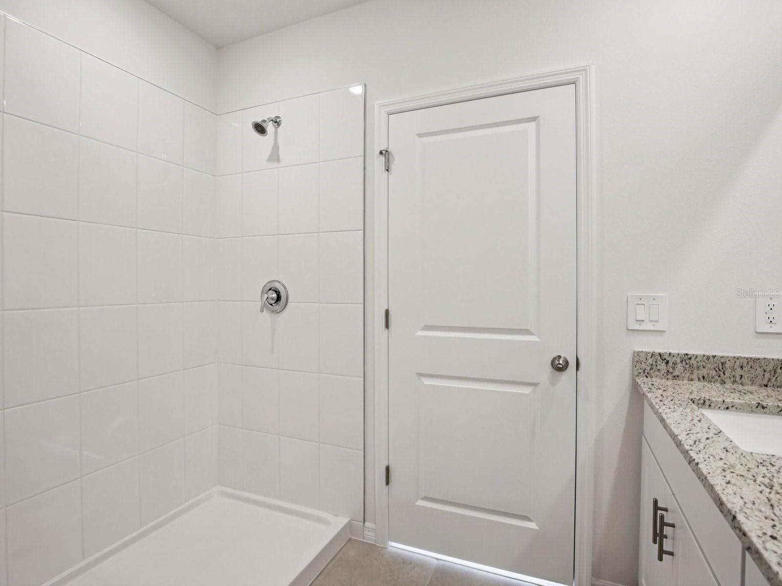 Interior photos are not of the actual home but are photos of the builder home with the same floorplan with similar interior finishes and features. - 11329 BELLEWOOD TER, PARRISH