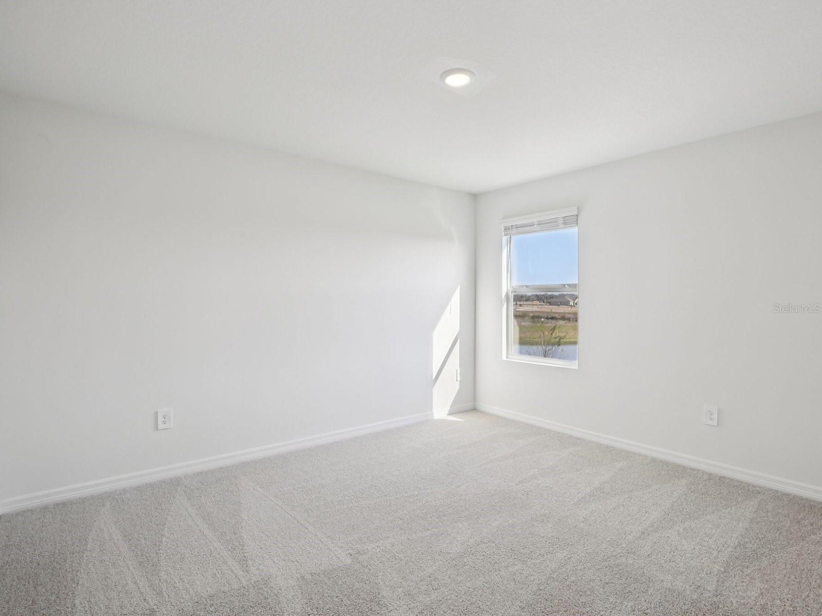 Interior photos are not of the actual home but are photos of the builder home with the same floorplan with similar interior finishes and features. - 11329 BELLEWOOD TER, PARRISH