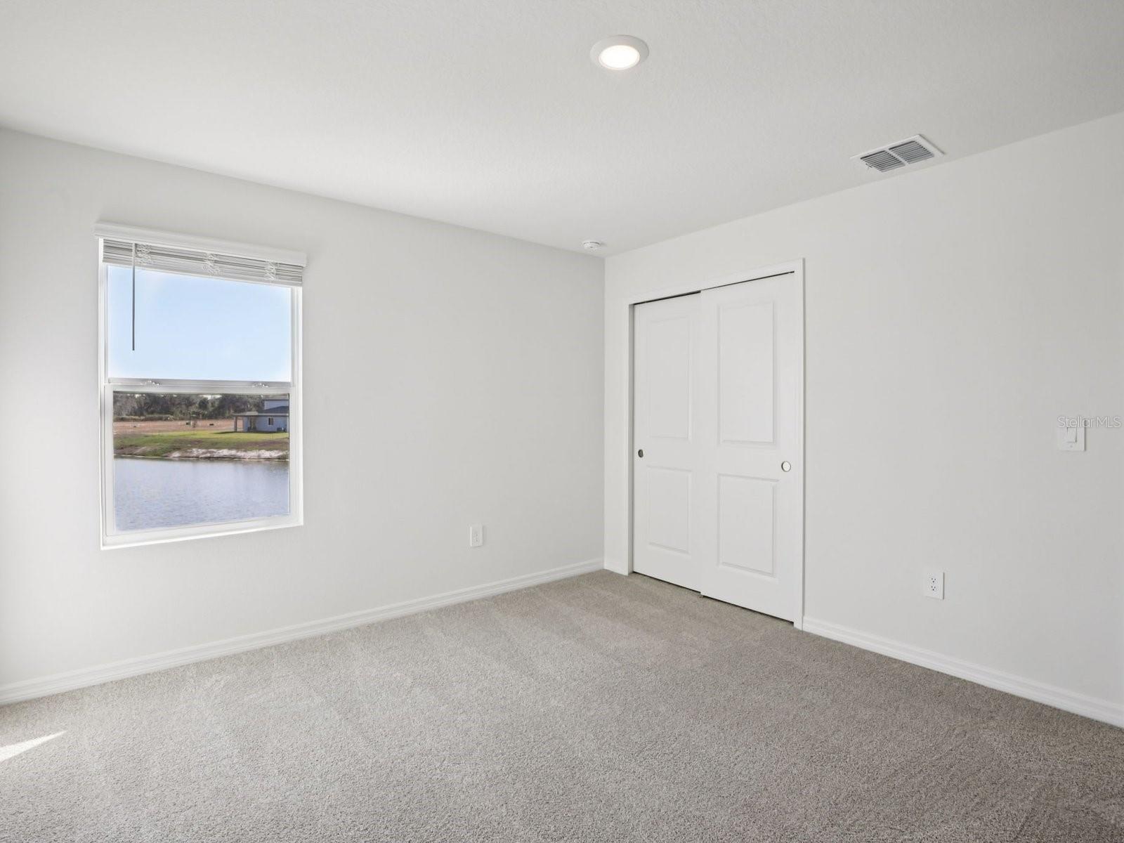 Interior photos are not of the actual home but are photos of the builder home with the same floorplan with similar interior finishes and features. - 11329 BELLEWOOD TER, PARRISH