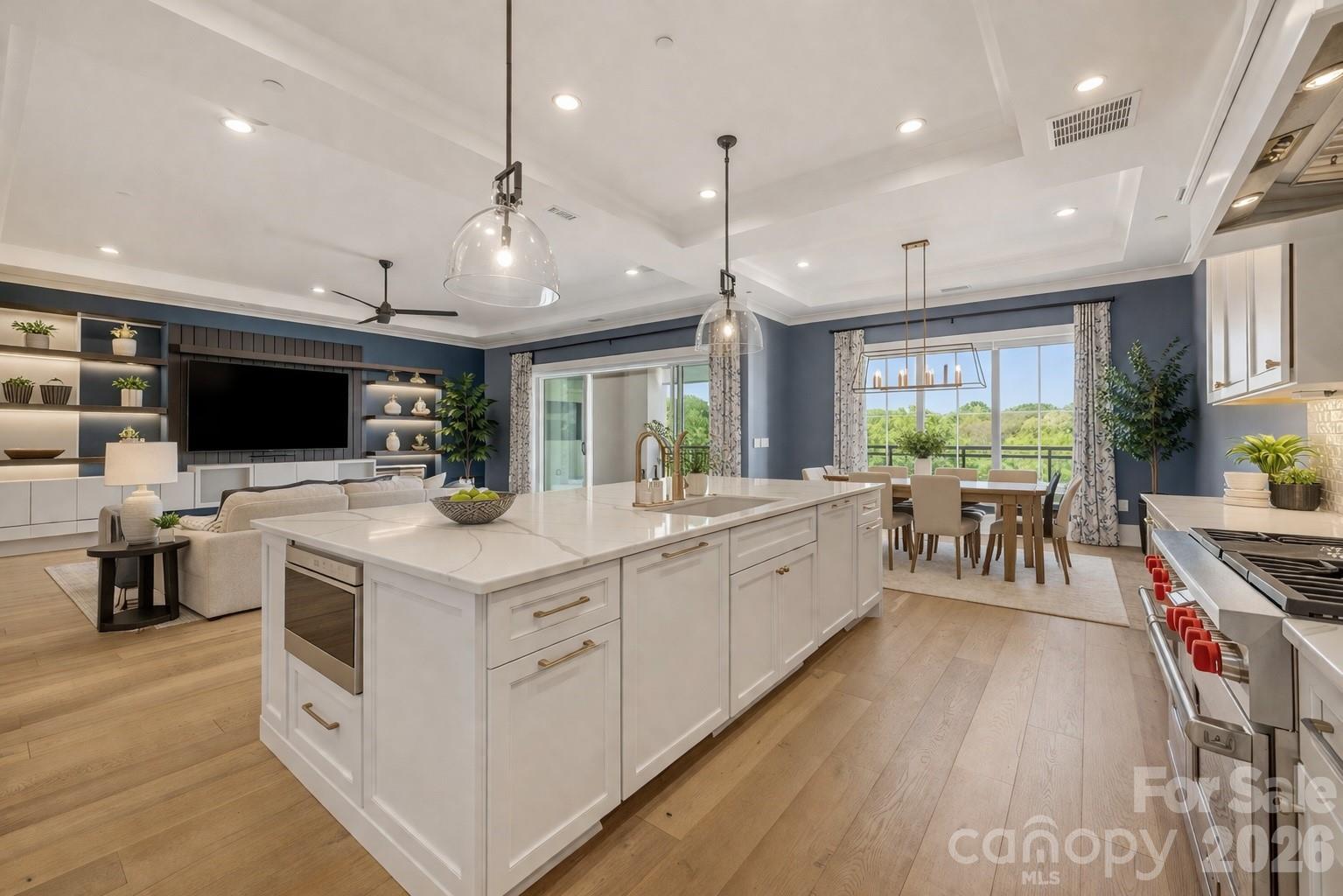 Virtually staged kithcen island overlooking open living - 19329 Watermark Drive, Cornelius