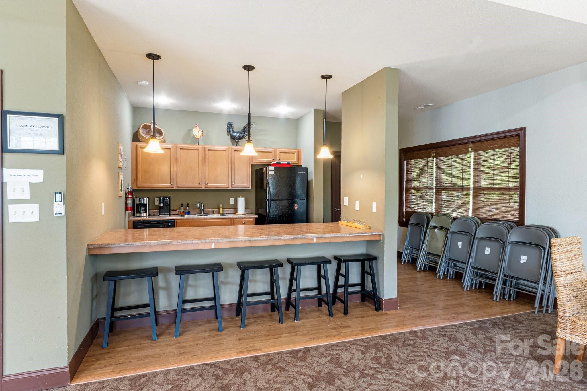 Full kitchen in the clubhouse for all your entertaining needs - 94 Foxden Drive, Fletcher