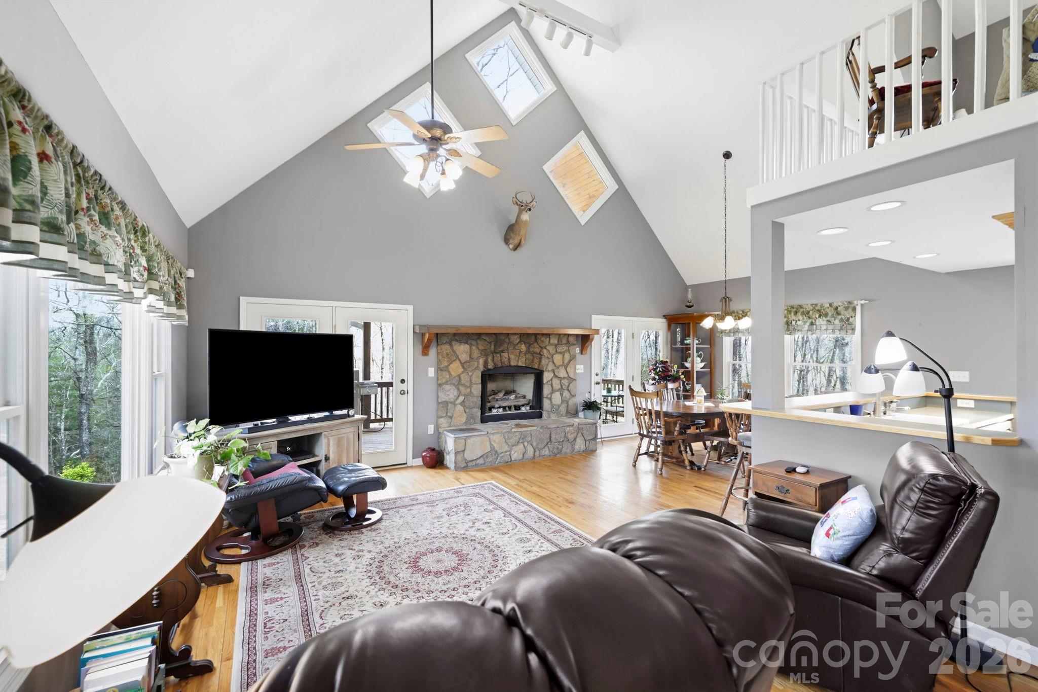 View of Living room as you enter the home - 13705 Rosman Highway, Lake Toxaway