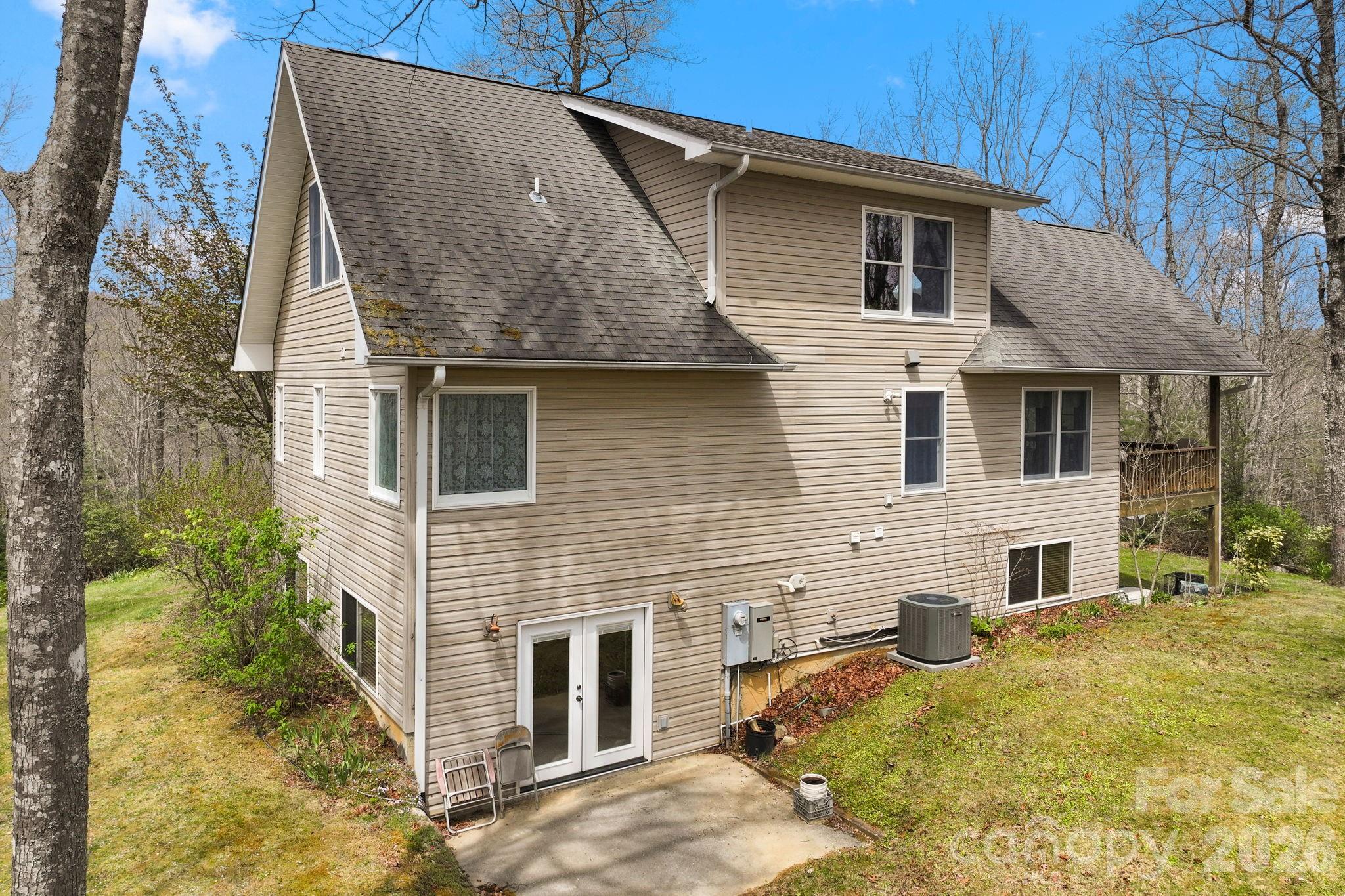Back view of the home showing separate entrance - 13705 Rosman Highway, Lake Toxaway