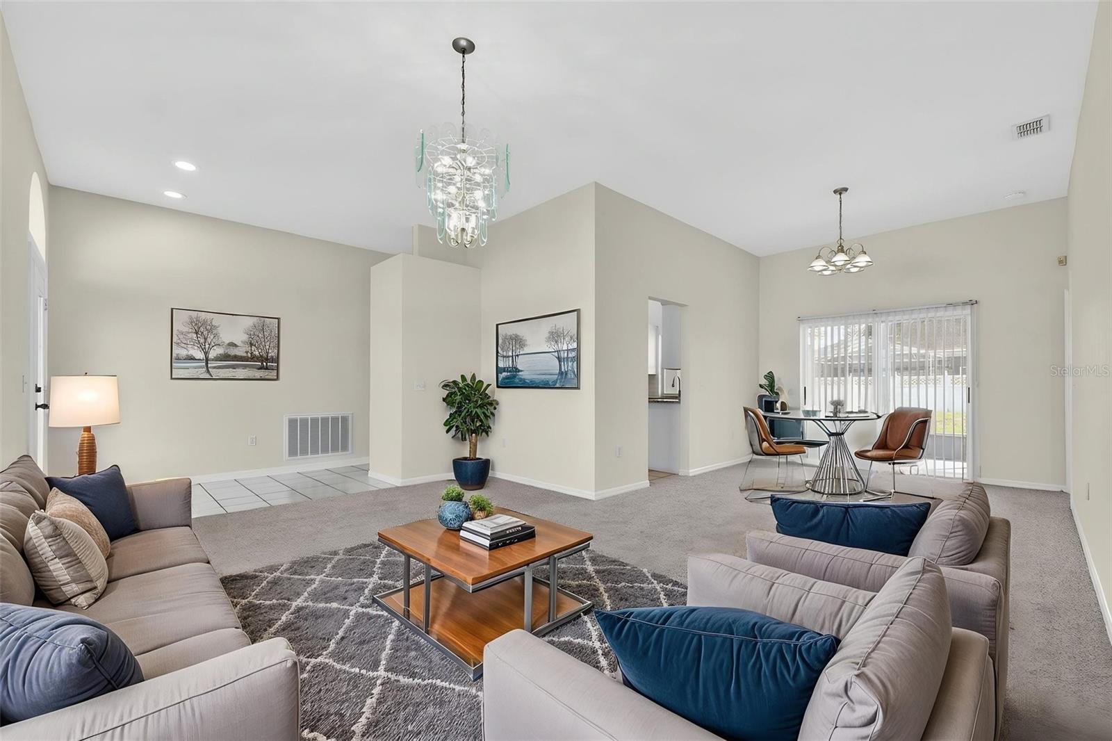 L-shaped Living and Dining area - 131 RUBY LAKE DR, WINTER HAVEN