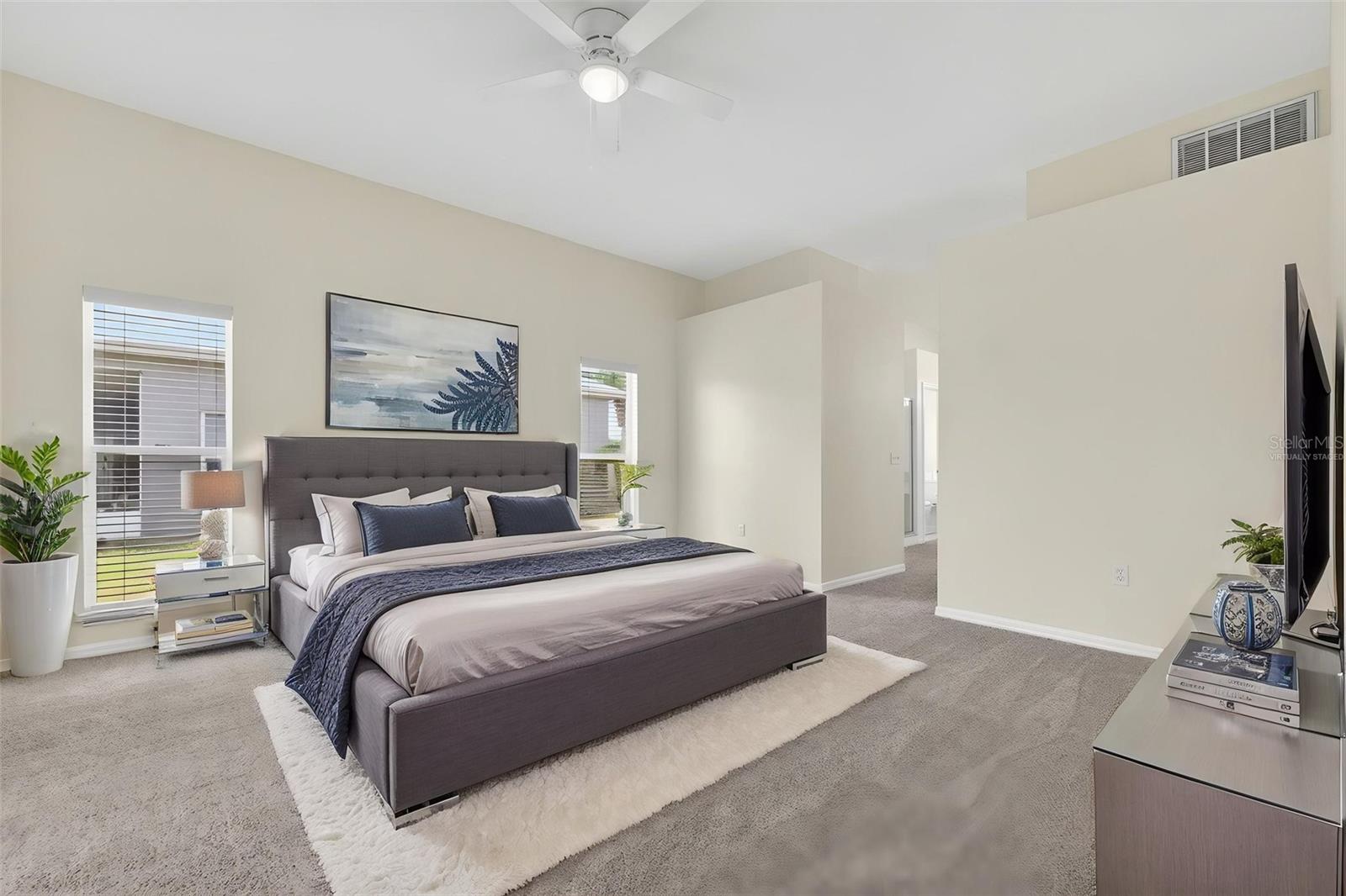 *Virtually Staged* Primary bedroom - 131 RUBY LAKE DR, WINTER HAVEN