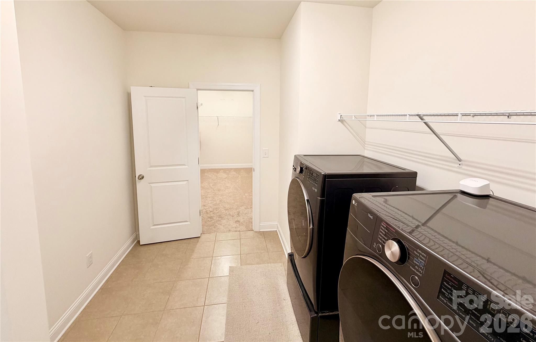 Laundry attached to Primary Closet - 725 Kathy Dianne Drive, Indian Land