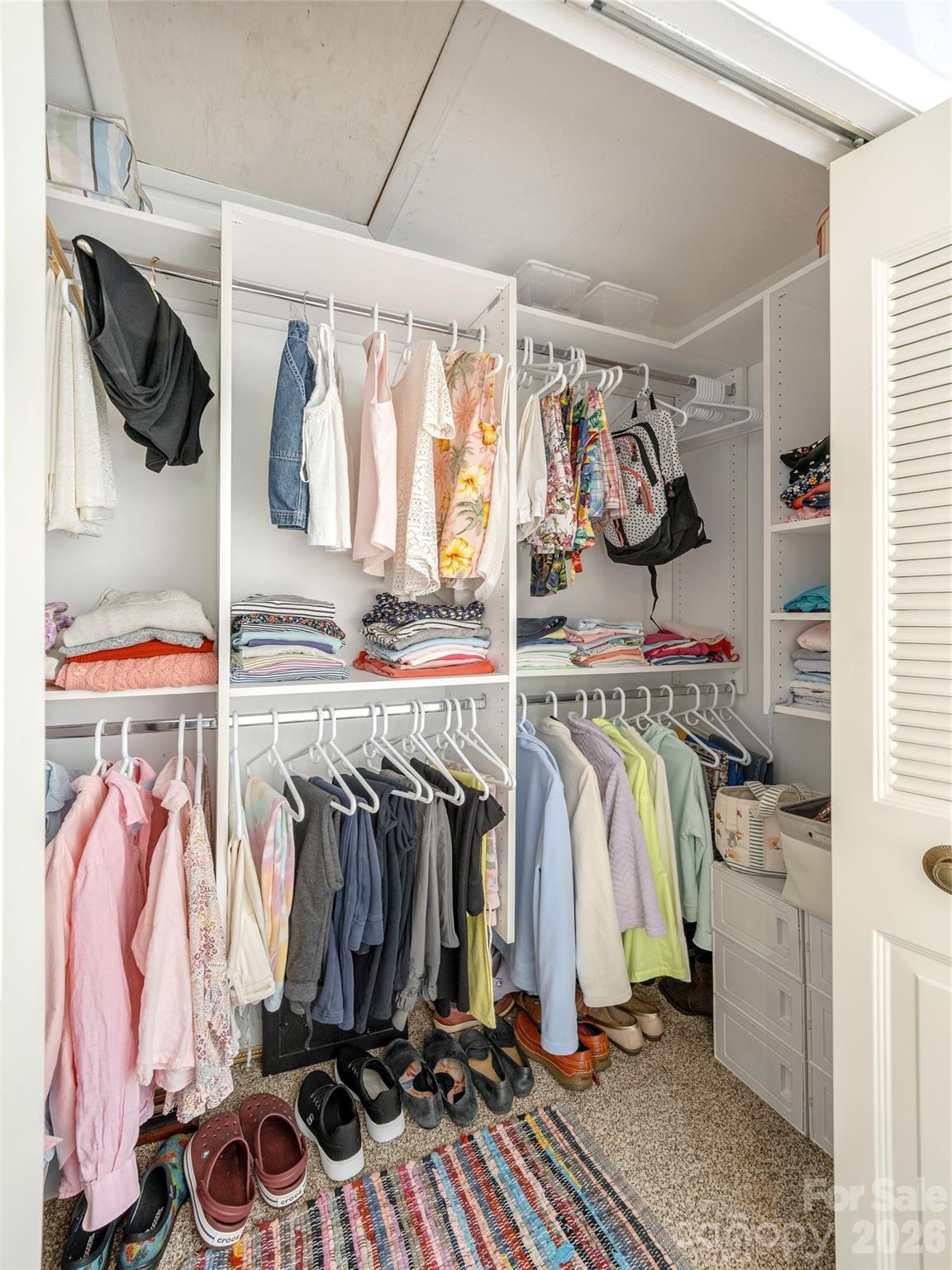 Primary walk-in closet - 103 Oakwood Place, Hendersonville