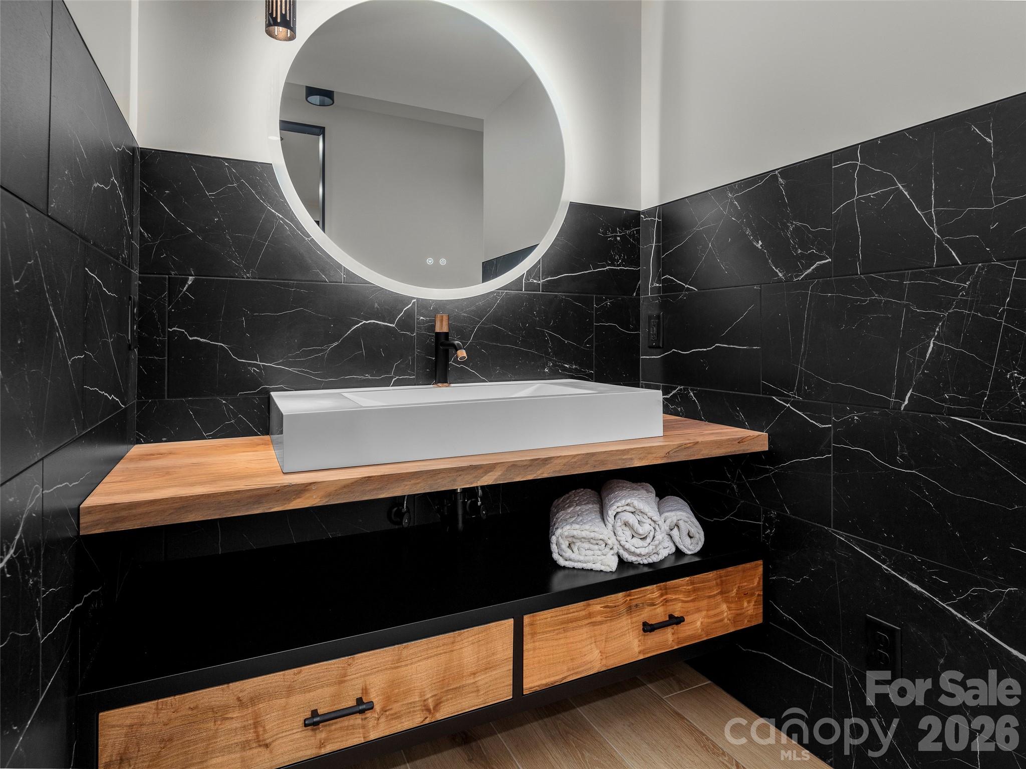 Downstairs sink and Vanity - 80 Hemlock Circle, Black Mountain