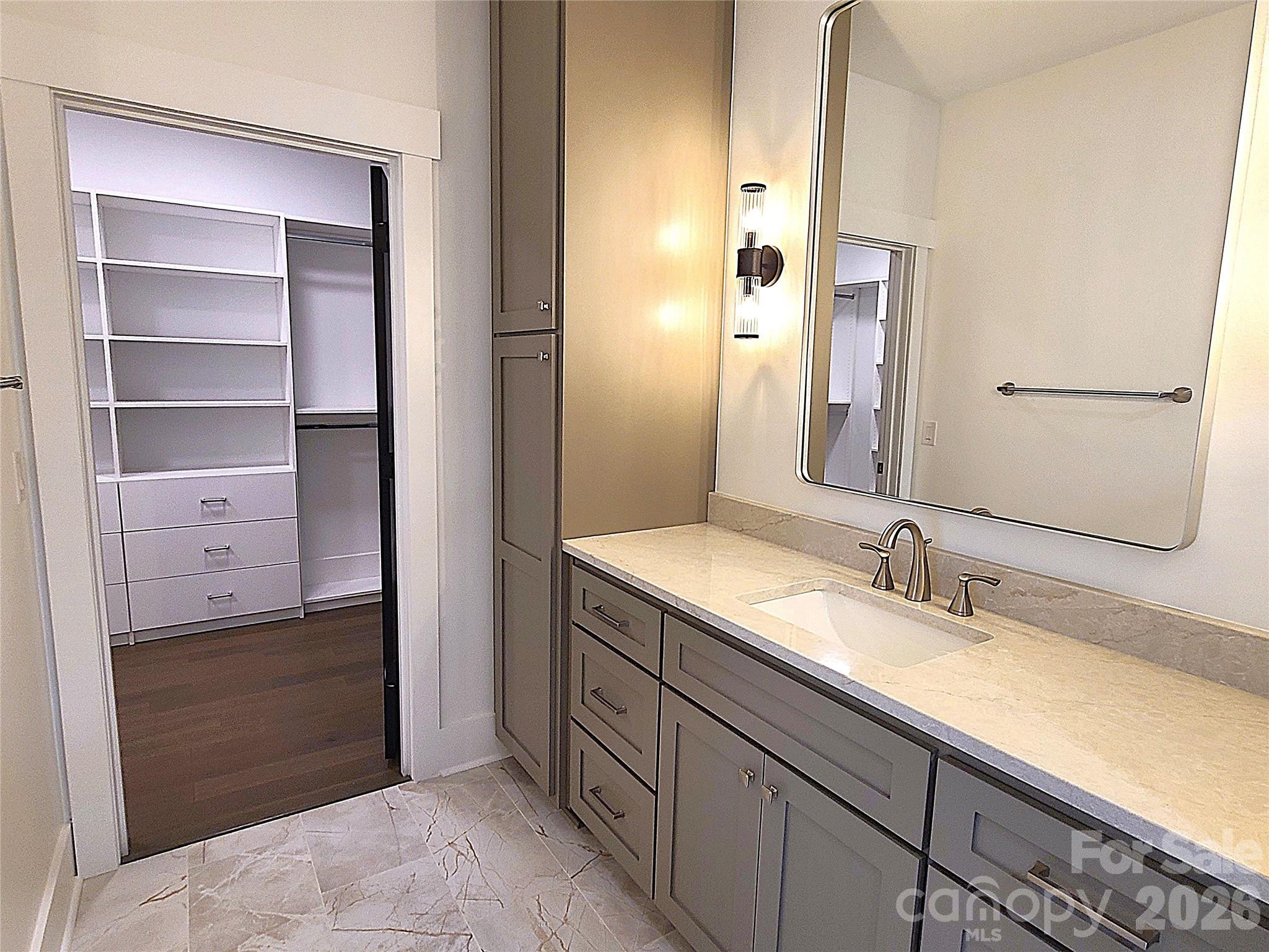 Primary bath entry to walk in closet - 444 19th Avenue Circle NW, Hickory