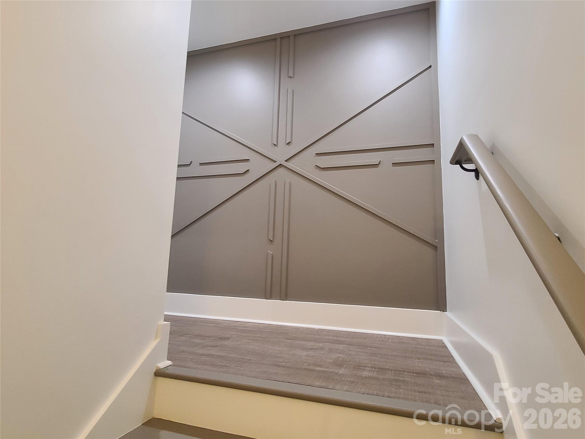 Accent wall on landing to downstairs - 444 19th Avenue Circle NW, Hickory