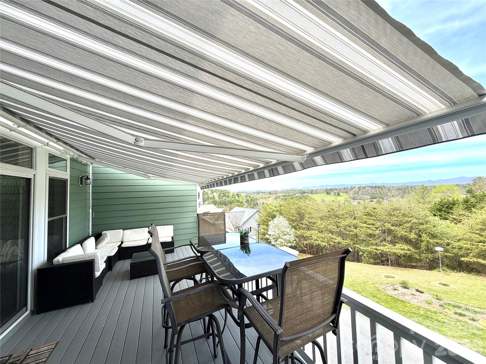 deck/porch off livingroom with retractable awning - 5 Gemini Heights, Weaverville