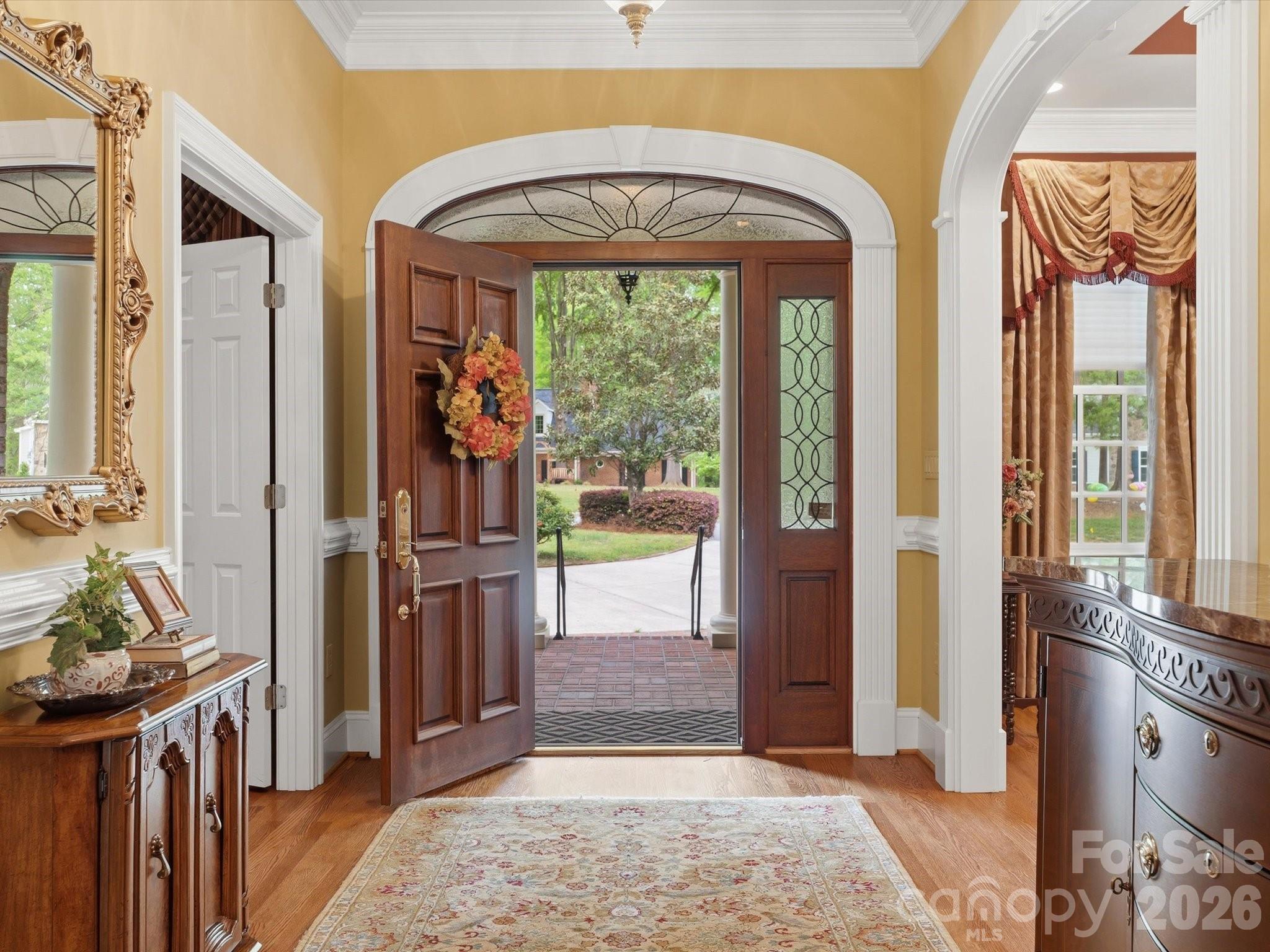 Solid wood entrance door/ transom window with leaded glass inserts - 1215 Rosa Drive, Monroe