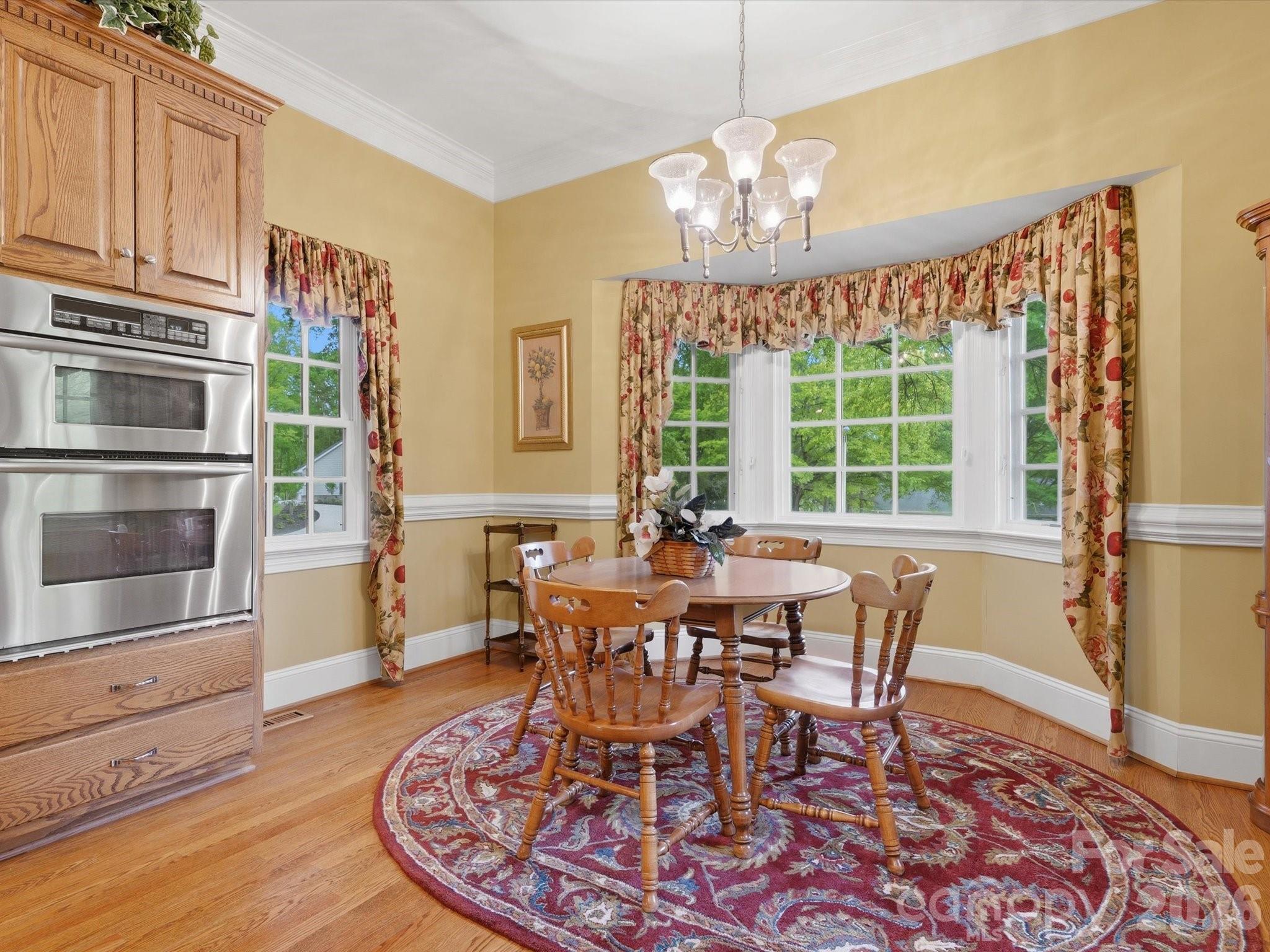 Kitchen breakfast area, microwave/ oven combo - 1215 Rosa Drive, Monroe