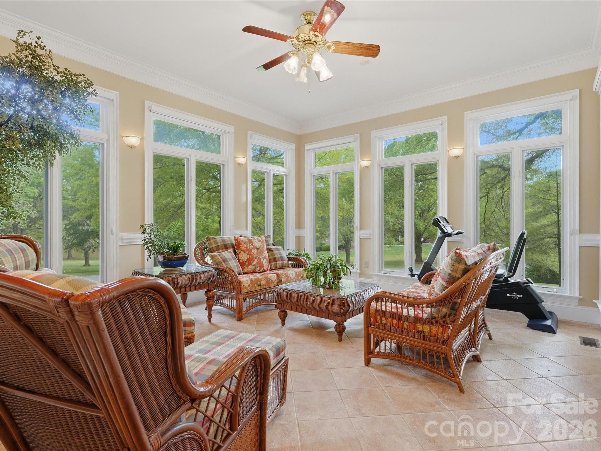 Four seasons sunroom - views of lake, private, wooded. Blinds installed. - 1215 Rosa Drive, Monroe