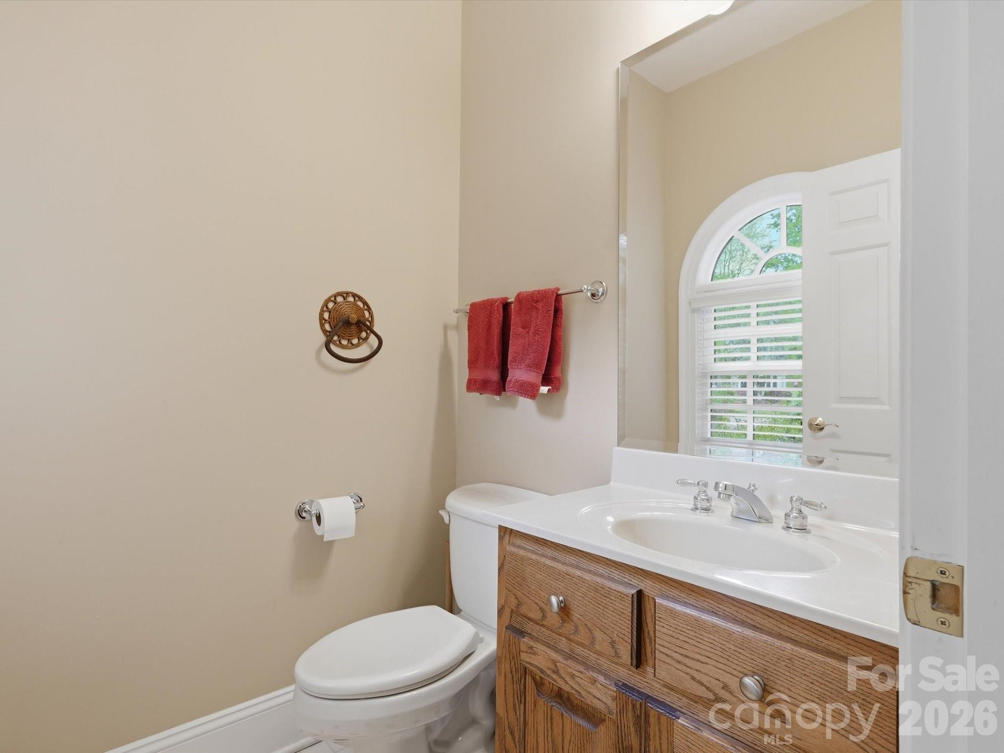 2nd half bath in hallway near garages. - 1215 Rosa Drive, Monroe