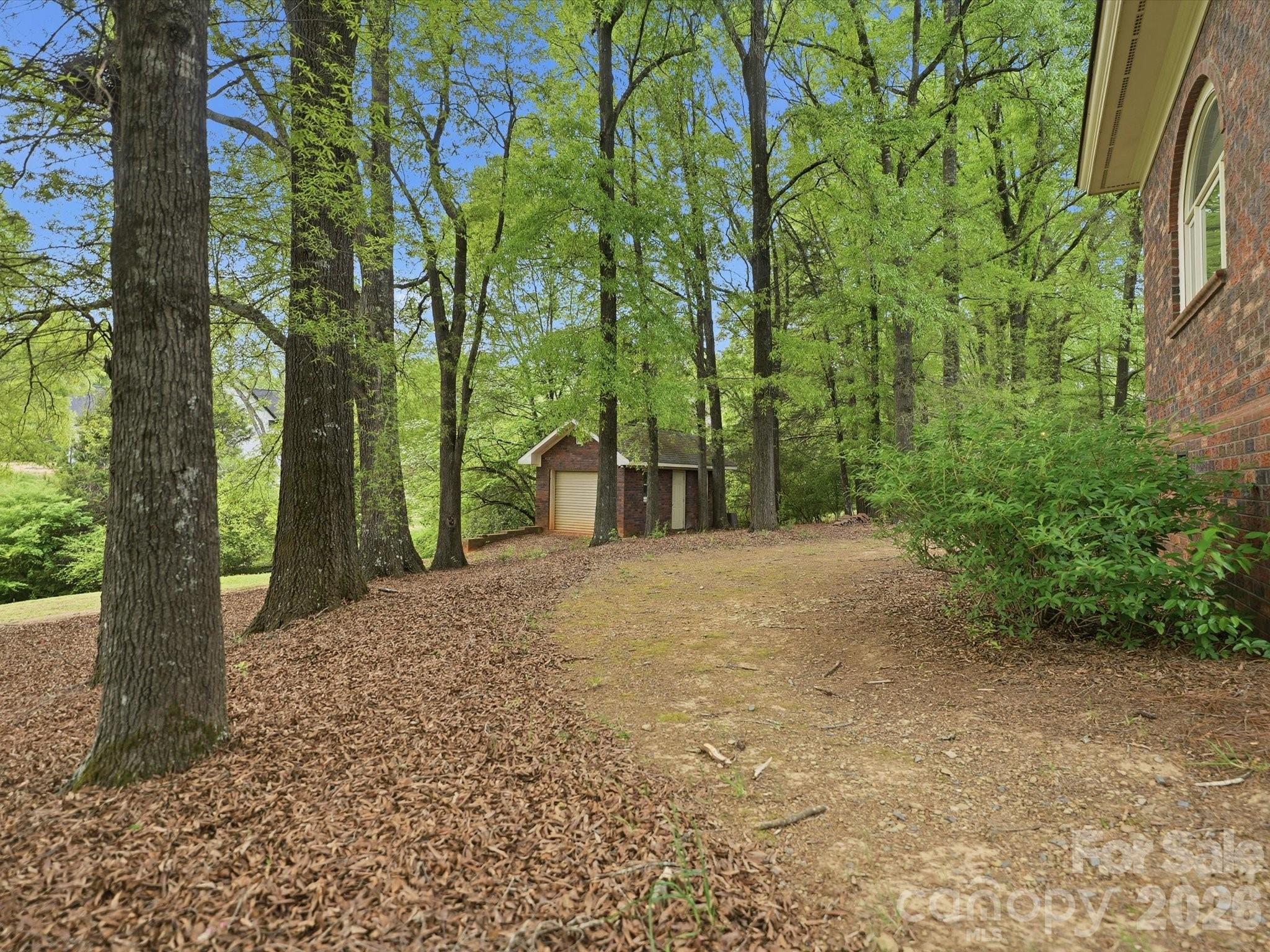 Additional detached garage for boat, golf cart, storage, workshop. Has electricity. - 1215 Rosa Drive, Monroe
