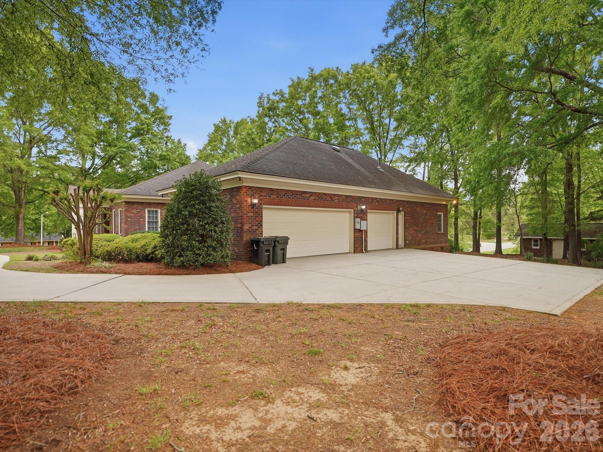 2 car garage and single bay garage with wall separating the two. Single bay is heated/cooled for workshop space optional - 1215 Rosa Drive, Monroe