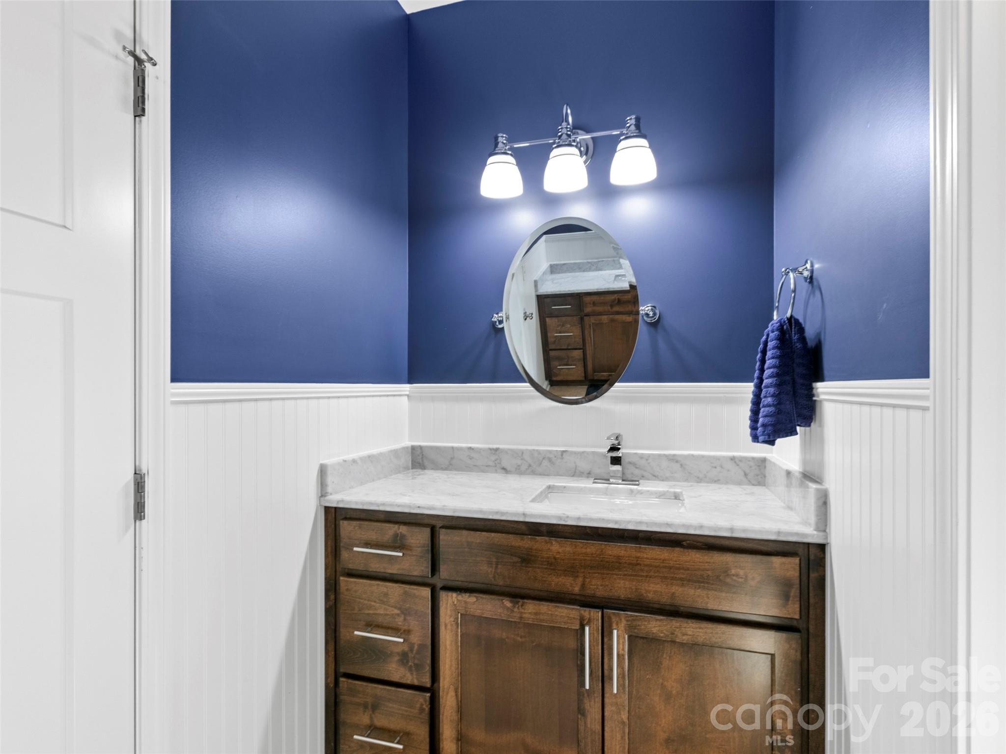 Stylish and functional full bath on the main level, ideal for guest accommodations or day-to-day convenience - 290 Sweetwater Hills Drive, Hendersonville