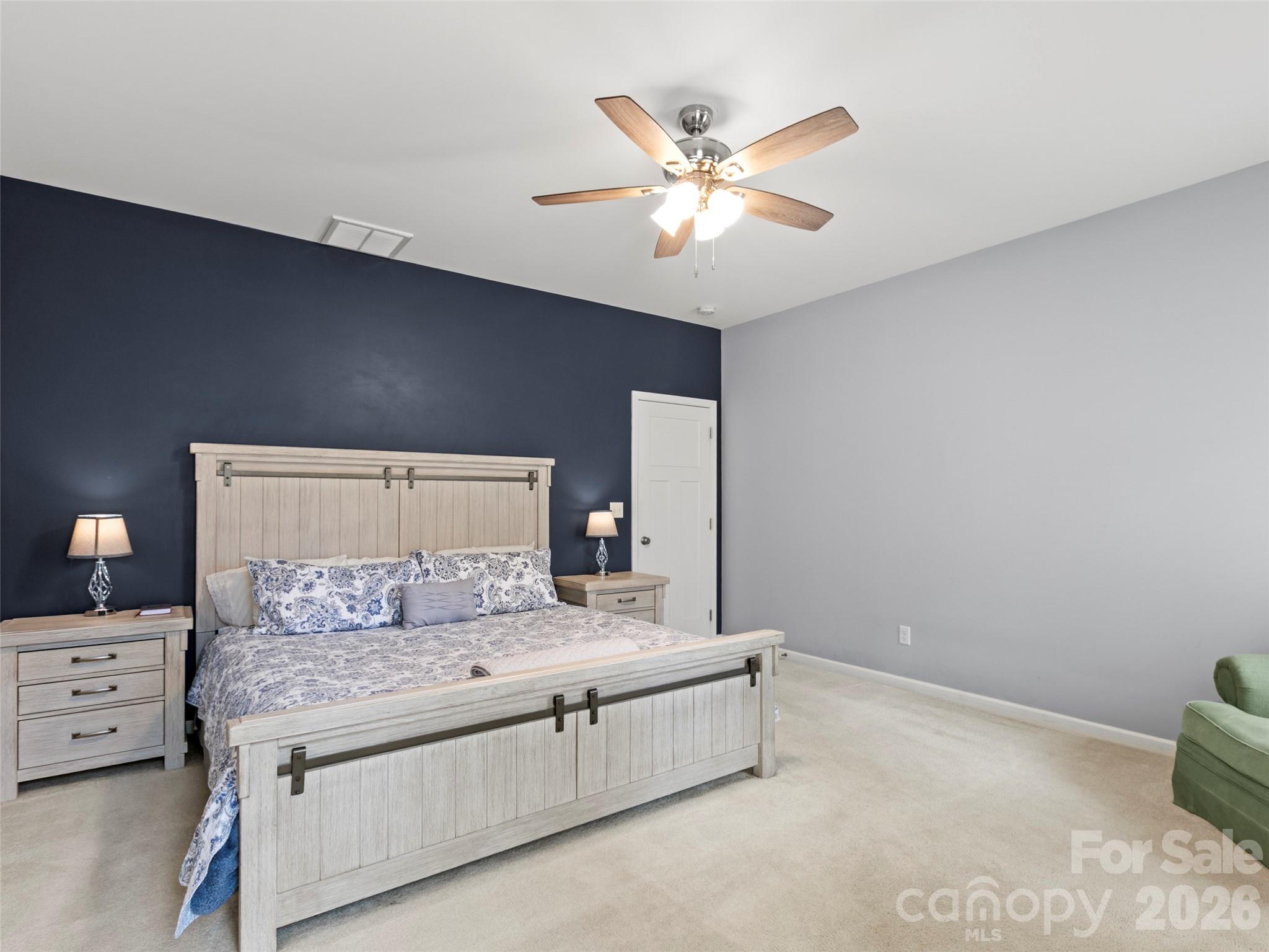 Spacious primary suite offering an elegant and restful retreat with a refined sense of comfort and style - 290 Sweetwater Hills Drive, Hendersonville