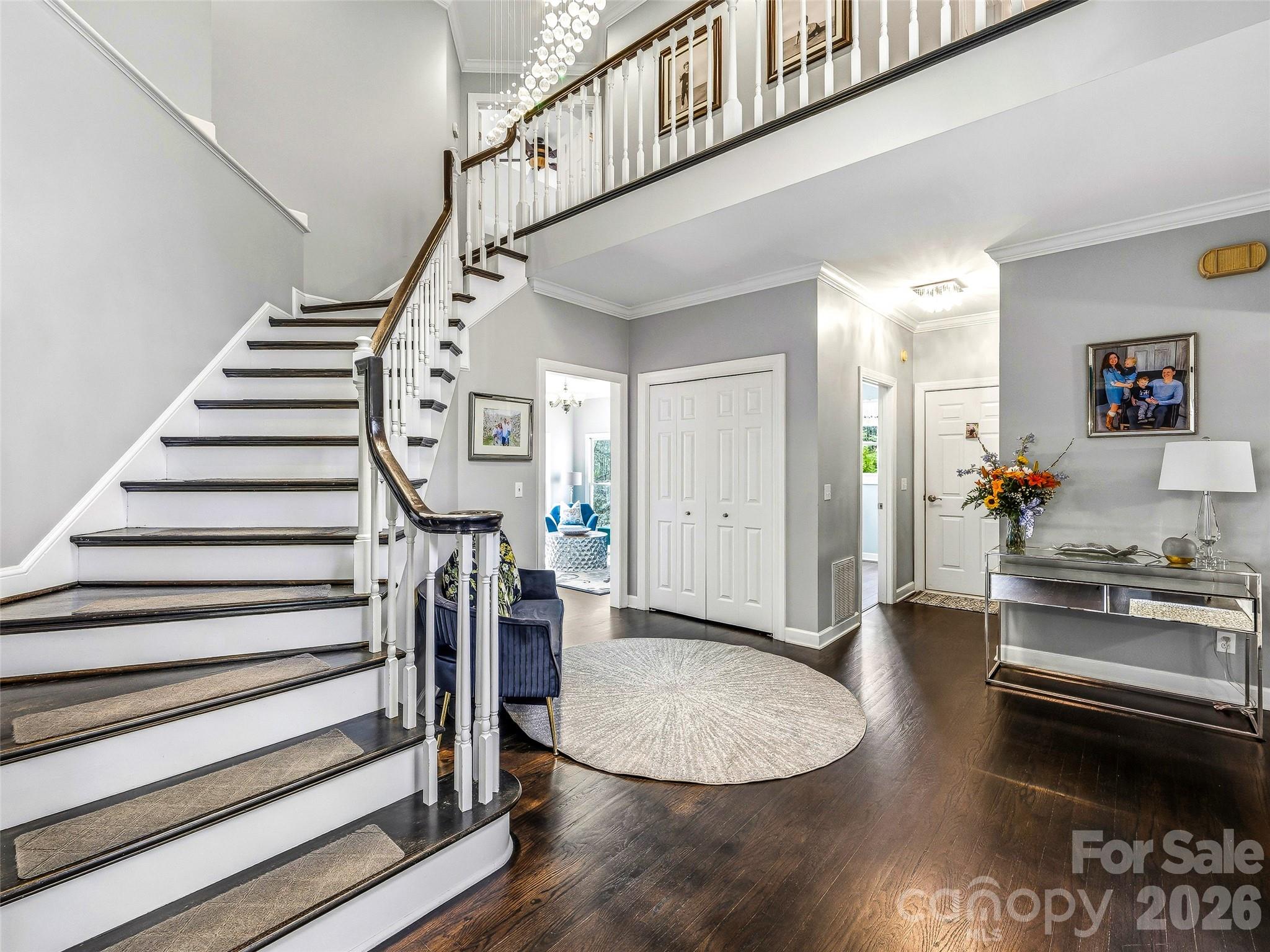 The foyer looking towards the family room, garage and laundry room. - 32 Franklin Farm Road, Fletcher