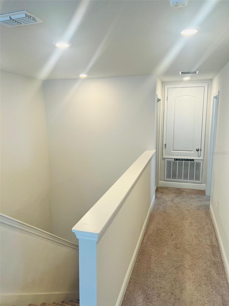 LAUNDRY ROOM ON BACK LEFT BEDROOM ON RIGHT - 1120 SUGARWOOD ST, DAVENPORT
