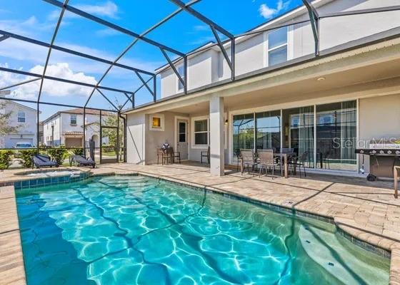 Screened in pool - 9042 SUNSHINE RIDGE LOOP, KISSIMMEE