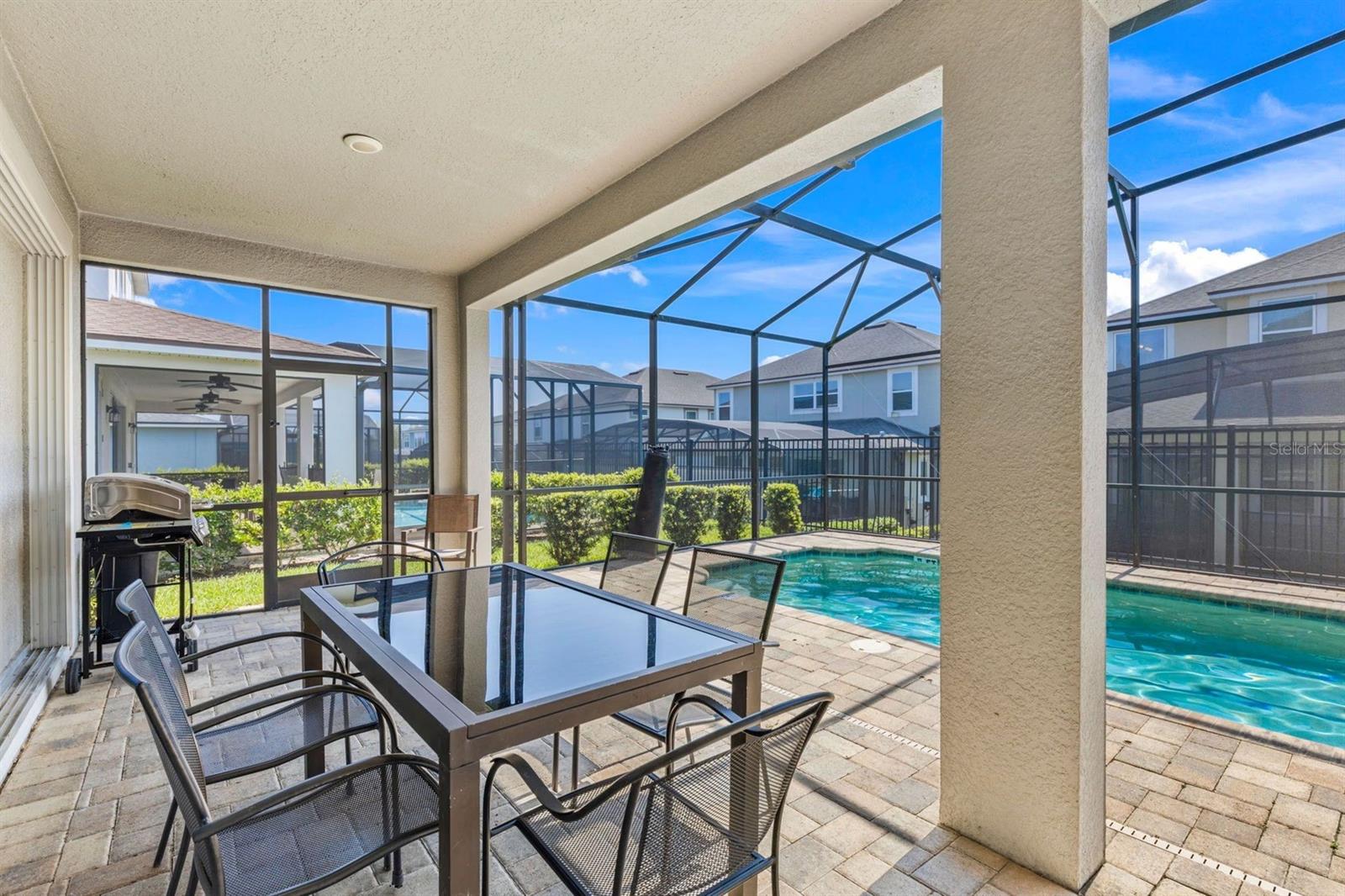 Covered outdoor dining & BBQ - 9042 SUNSHINE RIDGE LOOP, KISSIMMEE