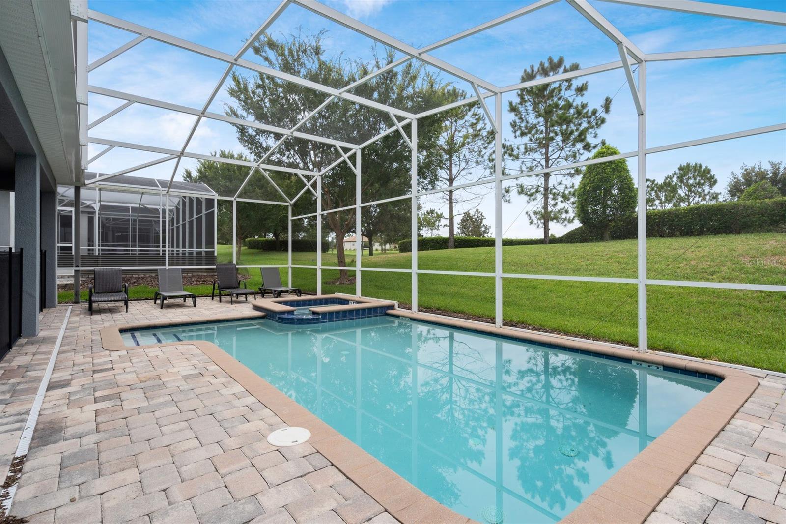 Screened in pool and spa - 9050 STINGER DR, DAVENPORT