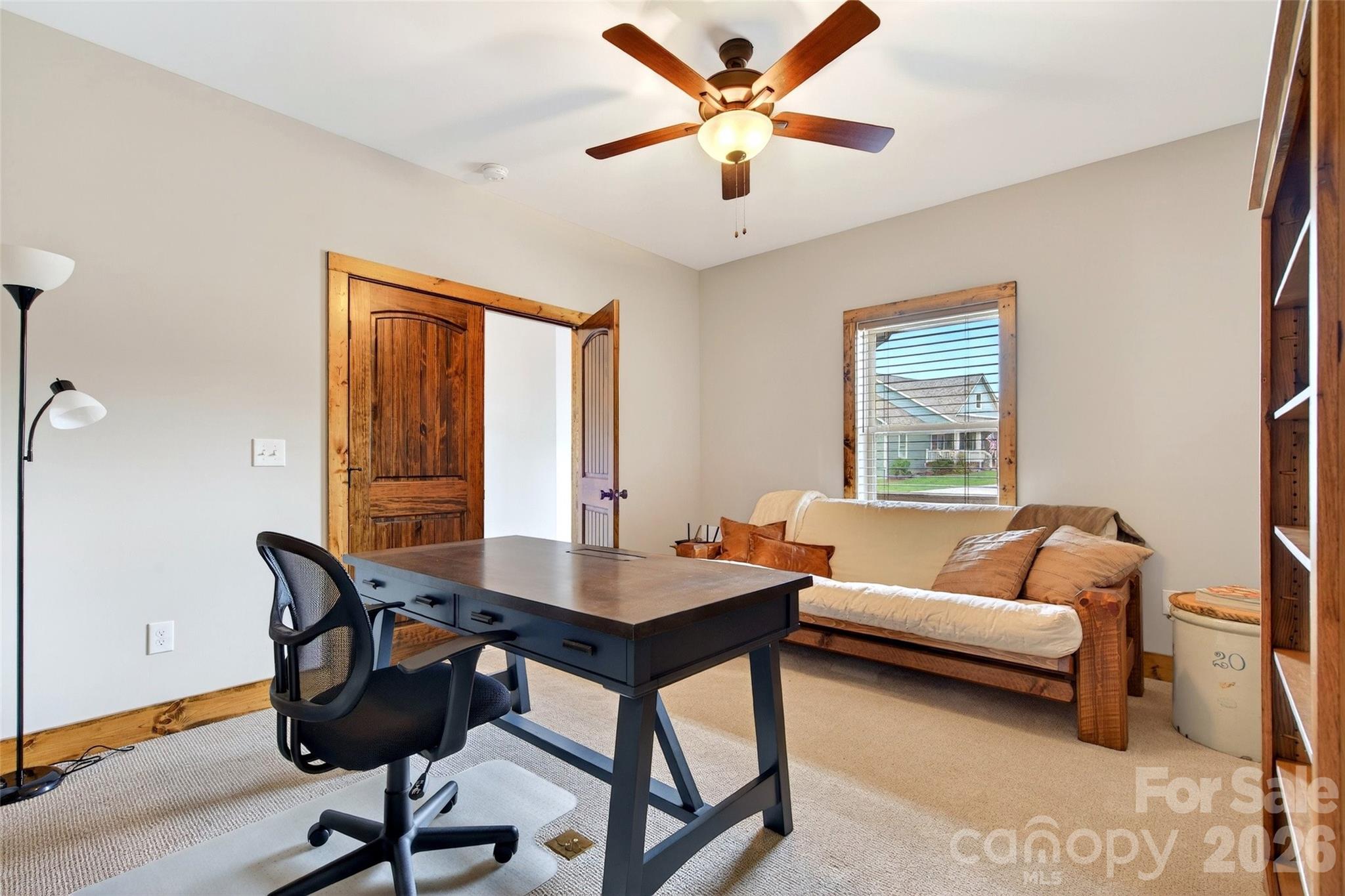Third main-level bedroom, shown as a home office - 207 Lake Crest Drive, Nebo