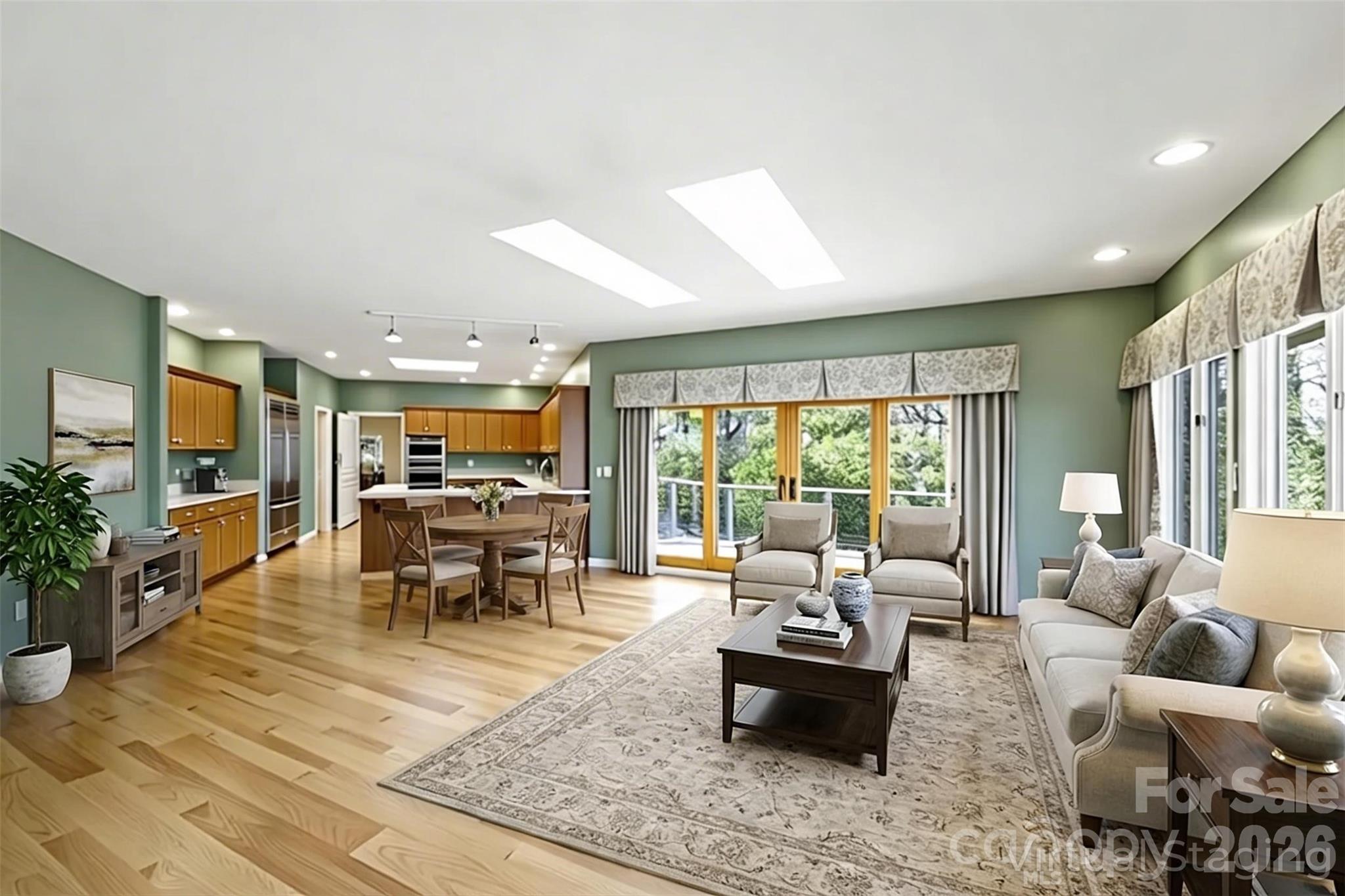 Den/Kitchen virtually staged - 100 Elmridge Drive, Flat Rock
