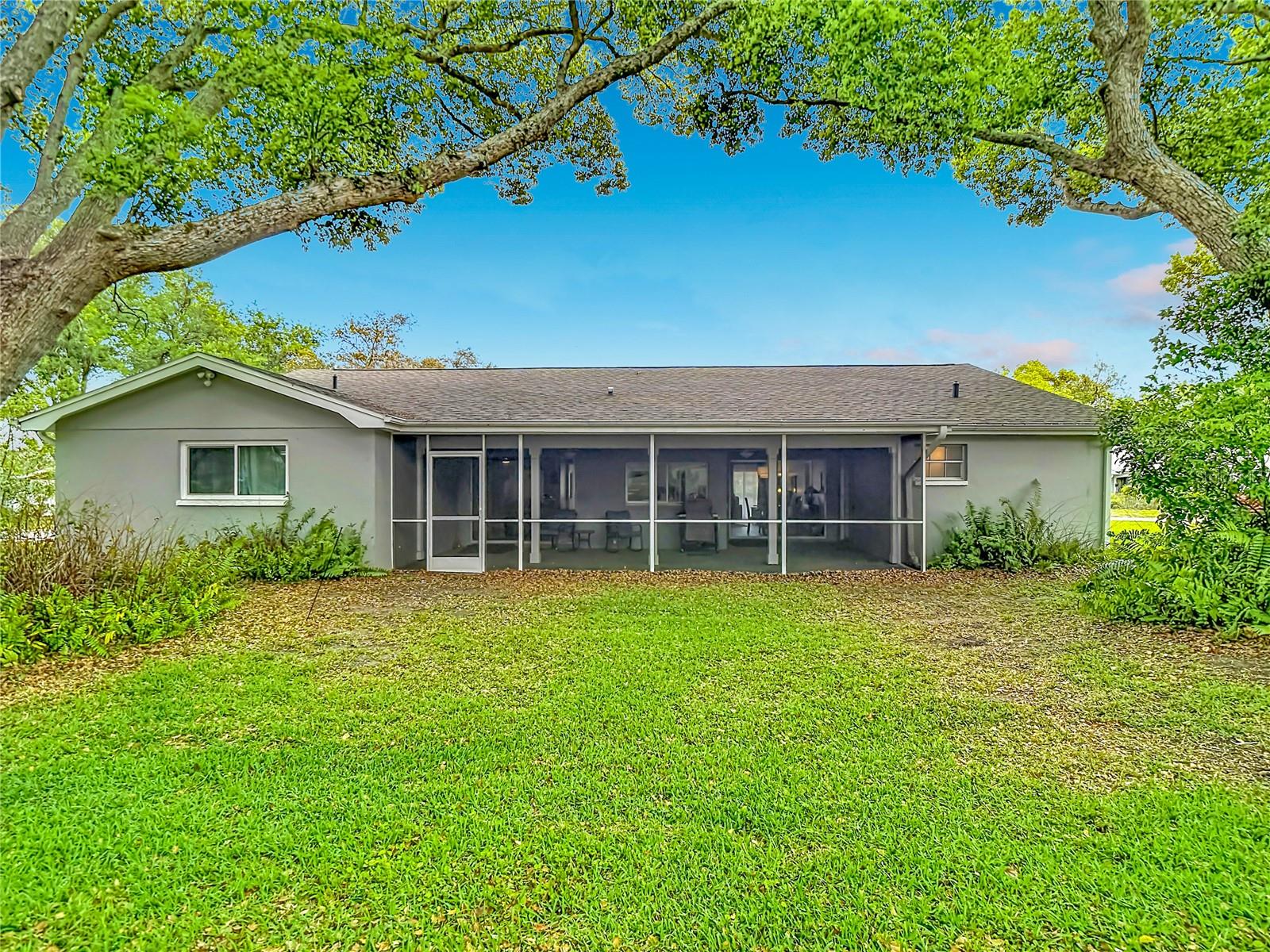 Rear view of the home. - 12709 CASTLEBERRY CT, HUDSON