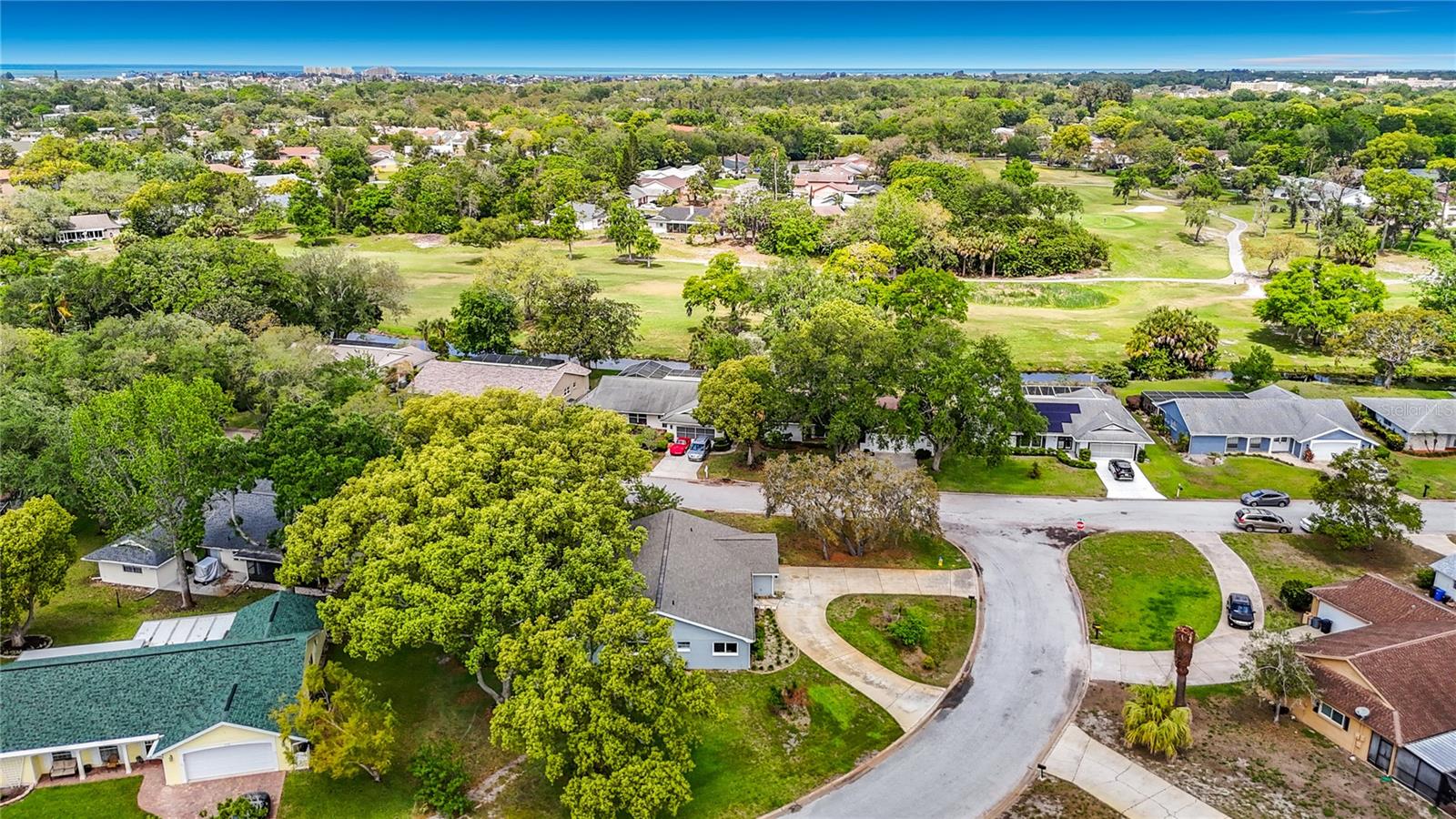 Aerial View of the home and back drop of the golf course - 12709 CASTLEBERRY CT, HUDSON