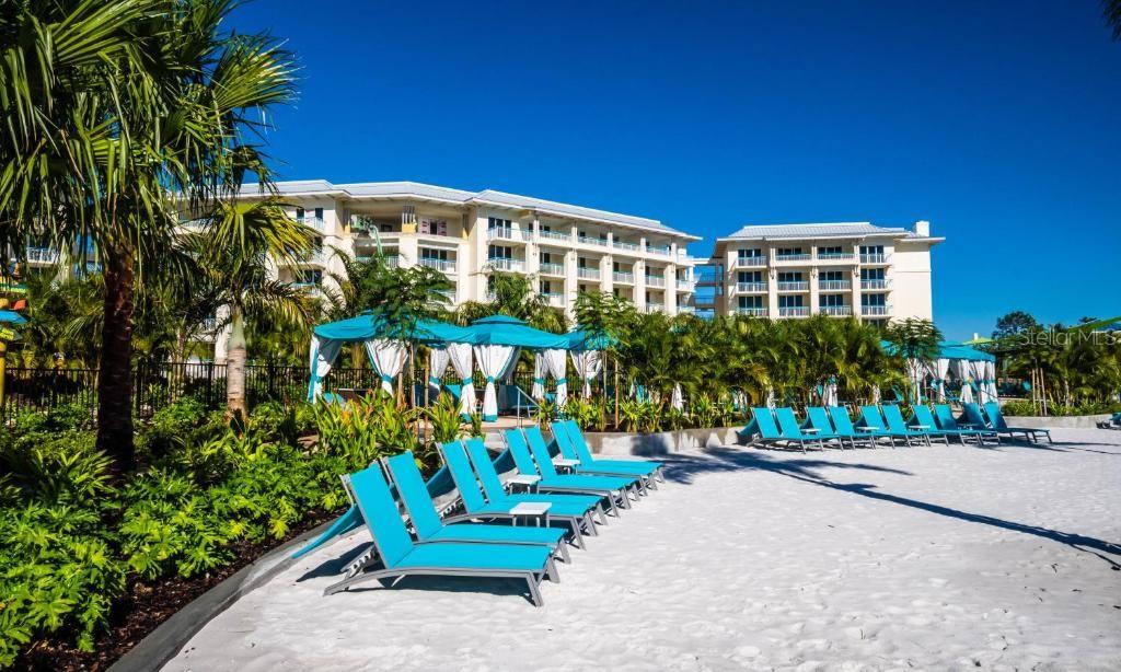 Resort pool with lounge seating in Margaritaville Resort Orlando Central Florida - 8075 KNEE DEEP RD, KISSIMMEE
