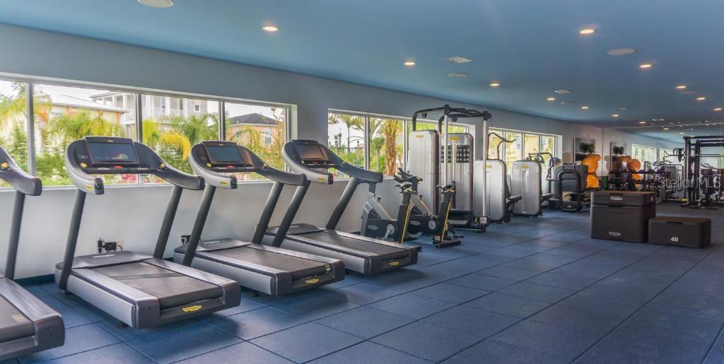 Modern fitness center with equipment in Margaritaville Resort Orlando KissimmeeModern fitness center with equipment in Margaritaville Resort Orlando Kissimmee - 8075 KNEE DEEP RD, KISSIMMEE
