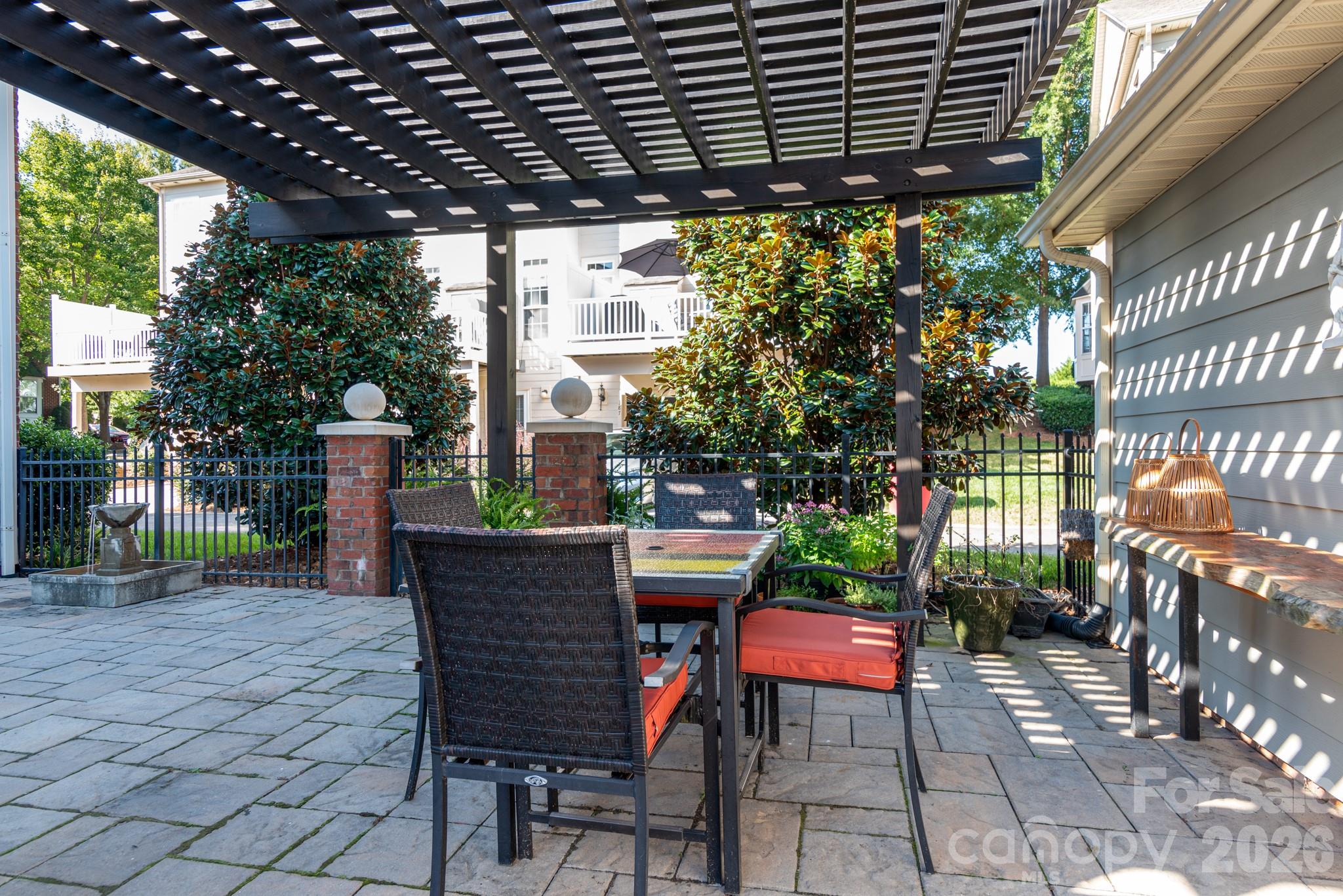 Side yard with beautiful Magnolia trees for privacy - 438 Magnolia Street, Davidson