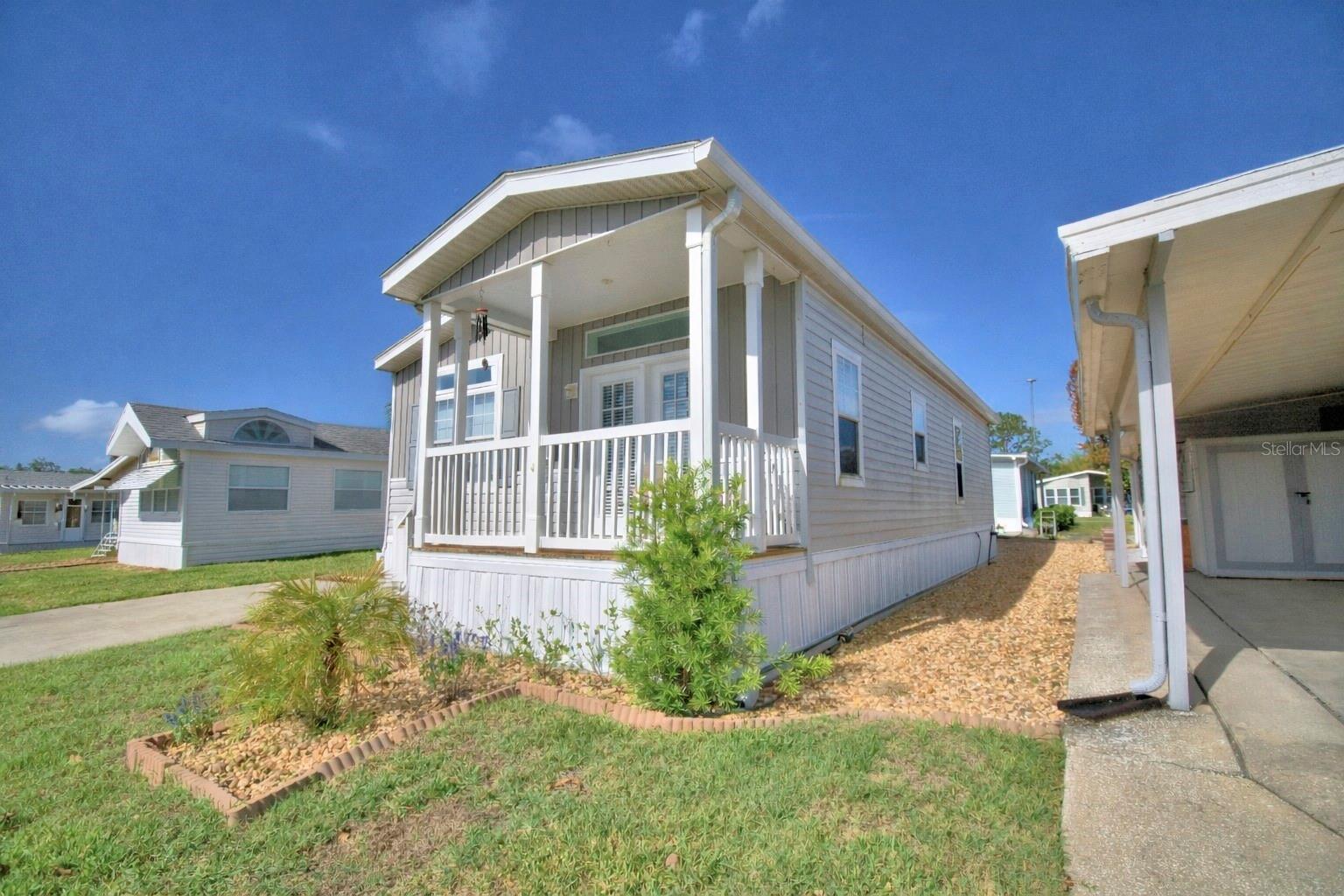 Manufactured Home at 4925 CYPRESS GARDENS RD #100, WINTER HAVEN, photo 3 of 56