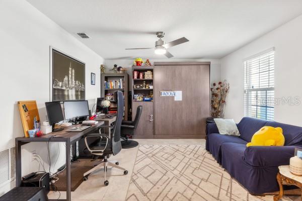 Flex space showing current arrangement and Murphy bed - 4382 FINCH LN, KISSIMMEE