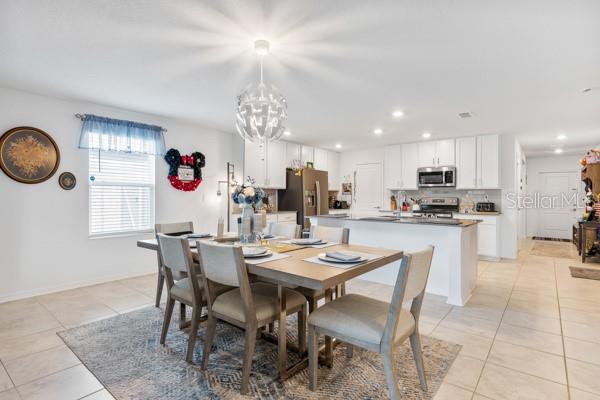 Dining and kitchen areas - 4382 FINCH LN, KISSIMMEE