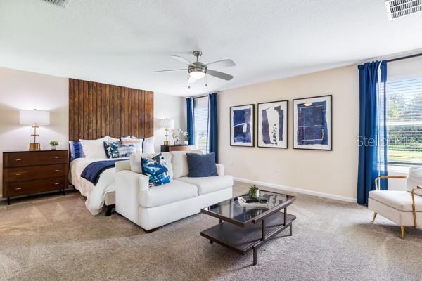 Owner suite bedroom current arrangement - 4382 FINCH LN, KISSIMMEE